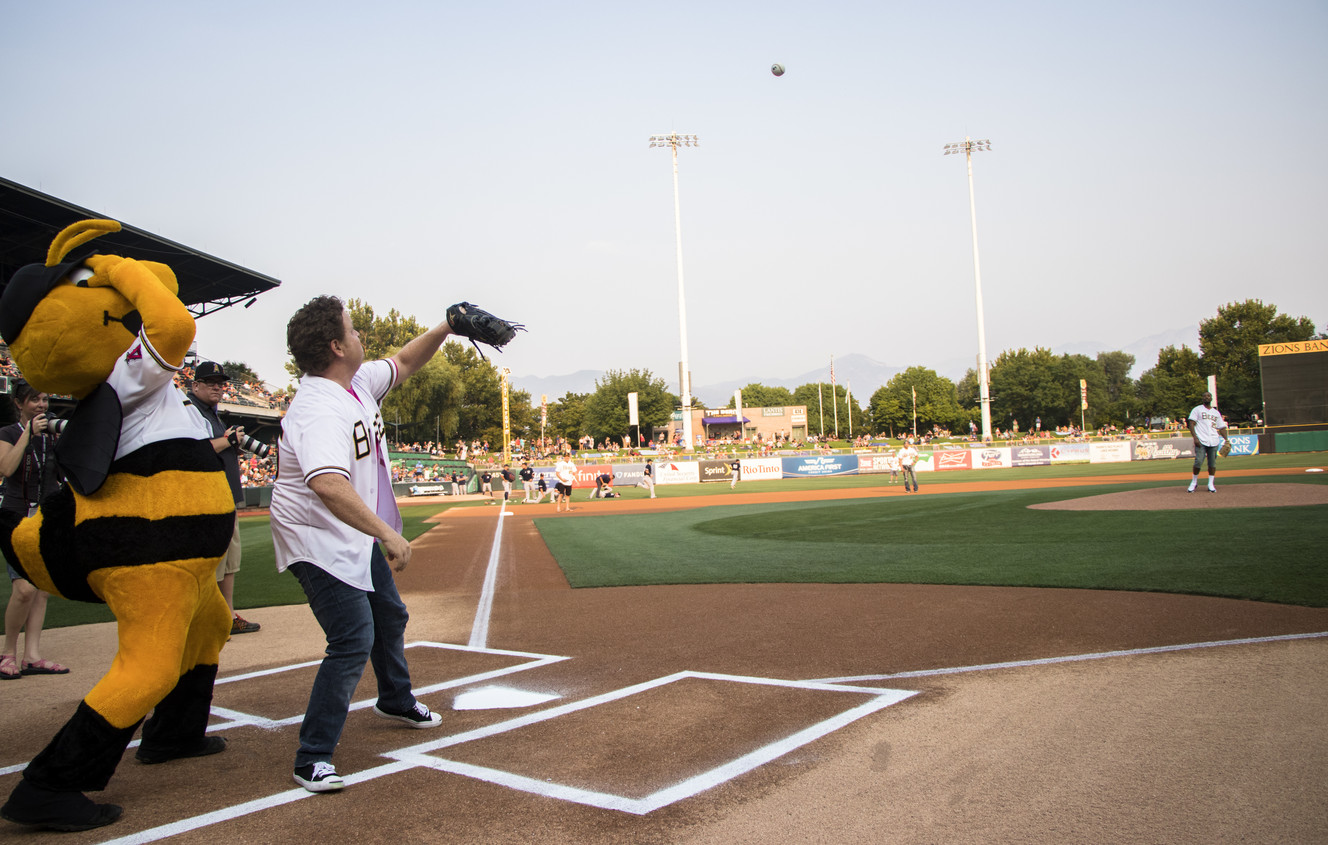 Brandon Adams, who played Kenny DeNunez in "The Sandlot," throws a ceremonial first pitch to Patrick Renna, who played Hamilton Porter, before a baseball game at Smith's Ballpark on Friday, Aug. 10, 2018. The movie, which was shot in Utah, debuted in theaters 25 years ago. (Photo: Carter Williams, KSL.com)