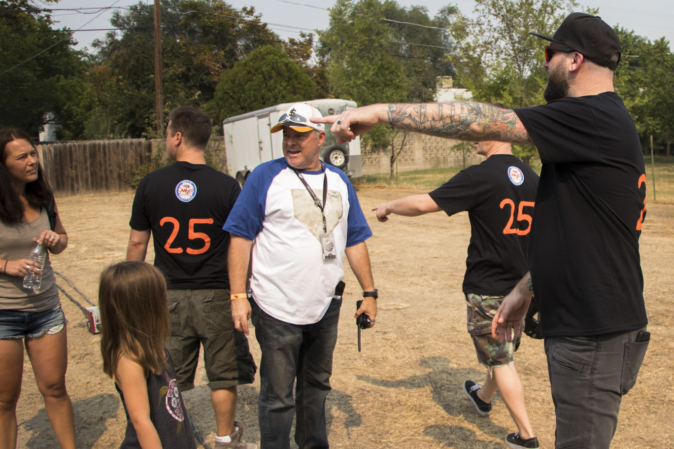 Grant Gelt, right, asks a question about a filming location to Marshall Moore, vice president of marketing and operations for Utah Film Studios and former director of the Utah Film Commission, at "The Sandlot" filming location in Salt Lake City on Saturday, Aug. 11, 2018. The movie turned 25 years ago this year. (Photo: Carter Williams, KSL.com)