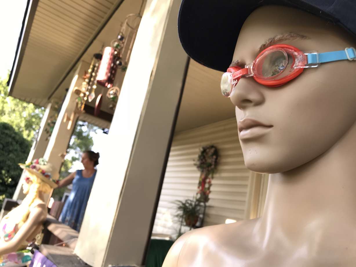 Mannequins in summer attire are pictured in front of Mary Denslow's home in Salt Lake City on Wednesday, Aug. 8, 2018. (Photo: KSL TV)