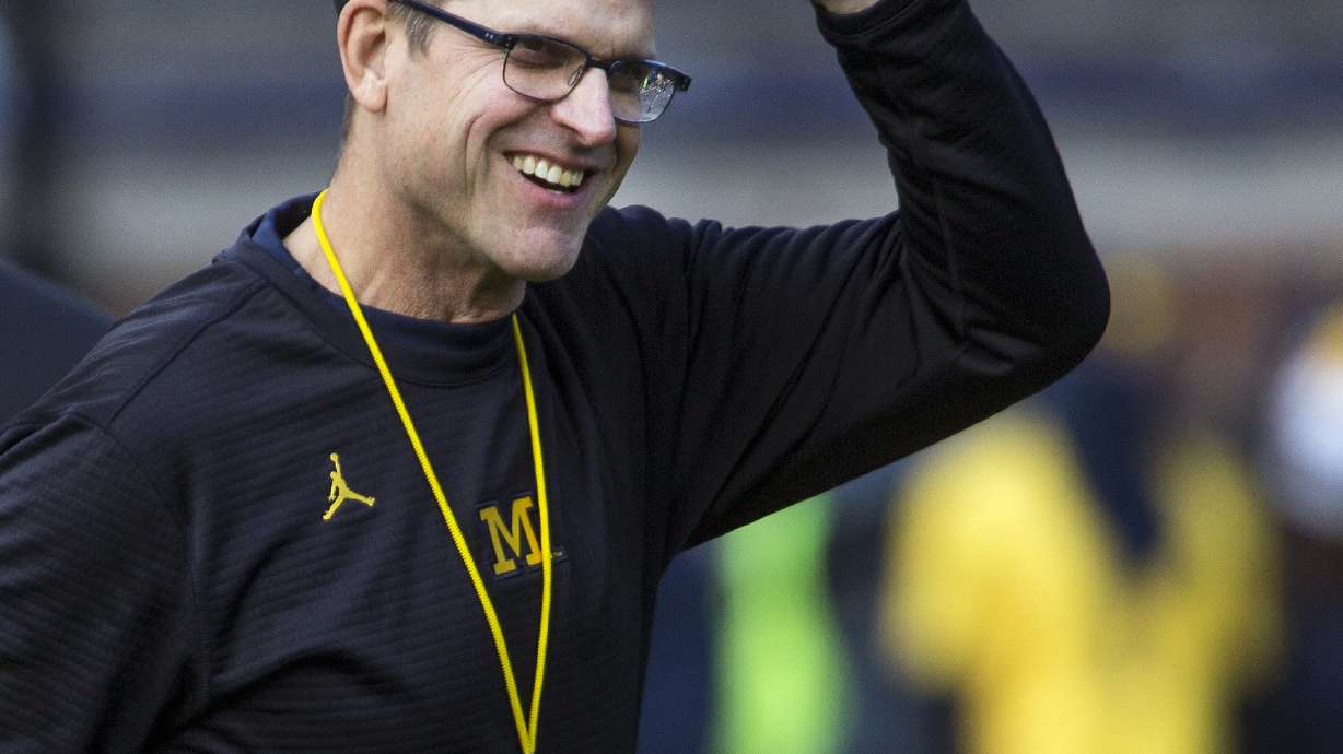 Harbaugh doesn't expect Michigan players to be suspended