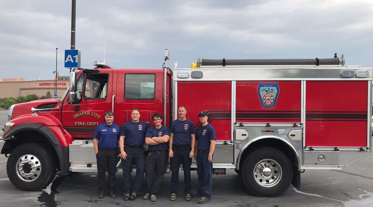 Battalion Chief Matt Burchett (left) poses with his crew as they prepare to fight wildfires in California. Burchett died Monday after sustaining injuries while battling the fire. Photo: Draper City Fire Department