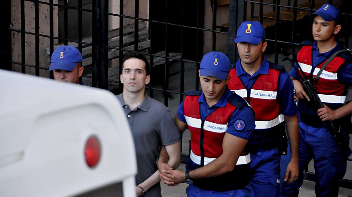 The Latest: 2 soldiers now in Greece after Turkey freed them