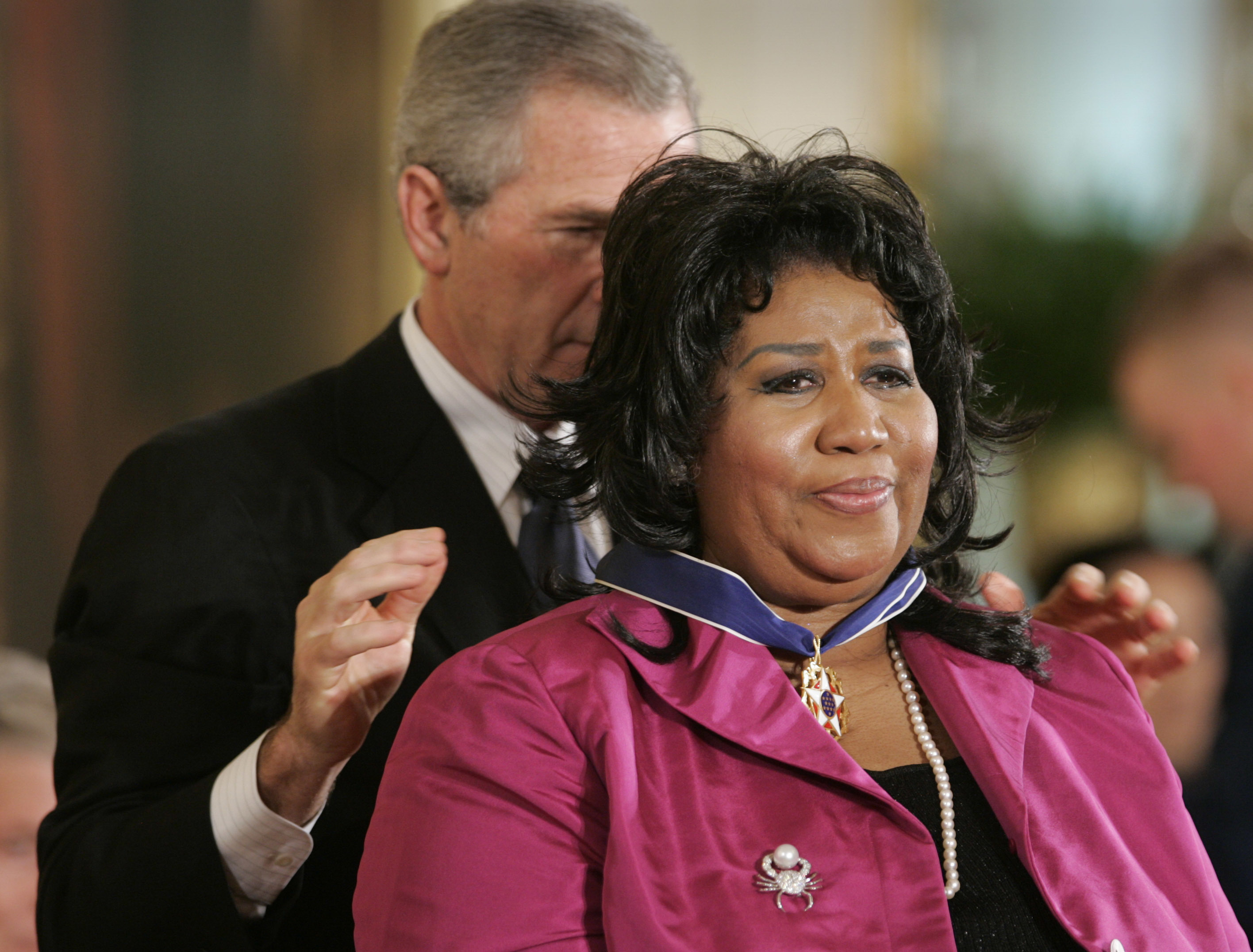 In this Nov. 9, 2005 file photo, President George W. Bush awards singer Aretha Franklin the Presidential Medal of Freedom Award, the highest civilian award, in the East Room of the White House in Washington. (Photo: AP Photo)