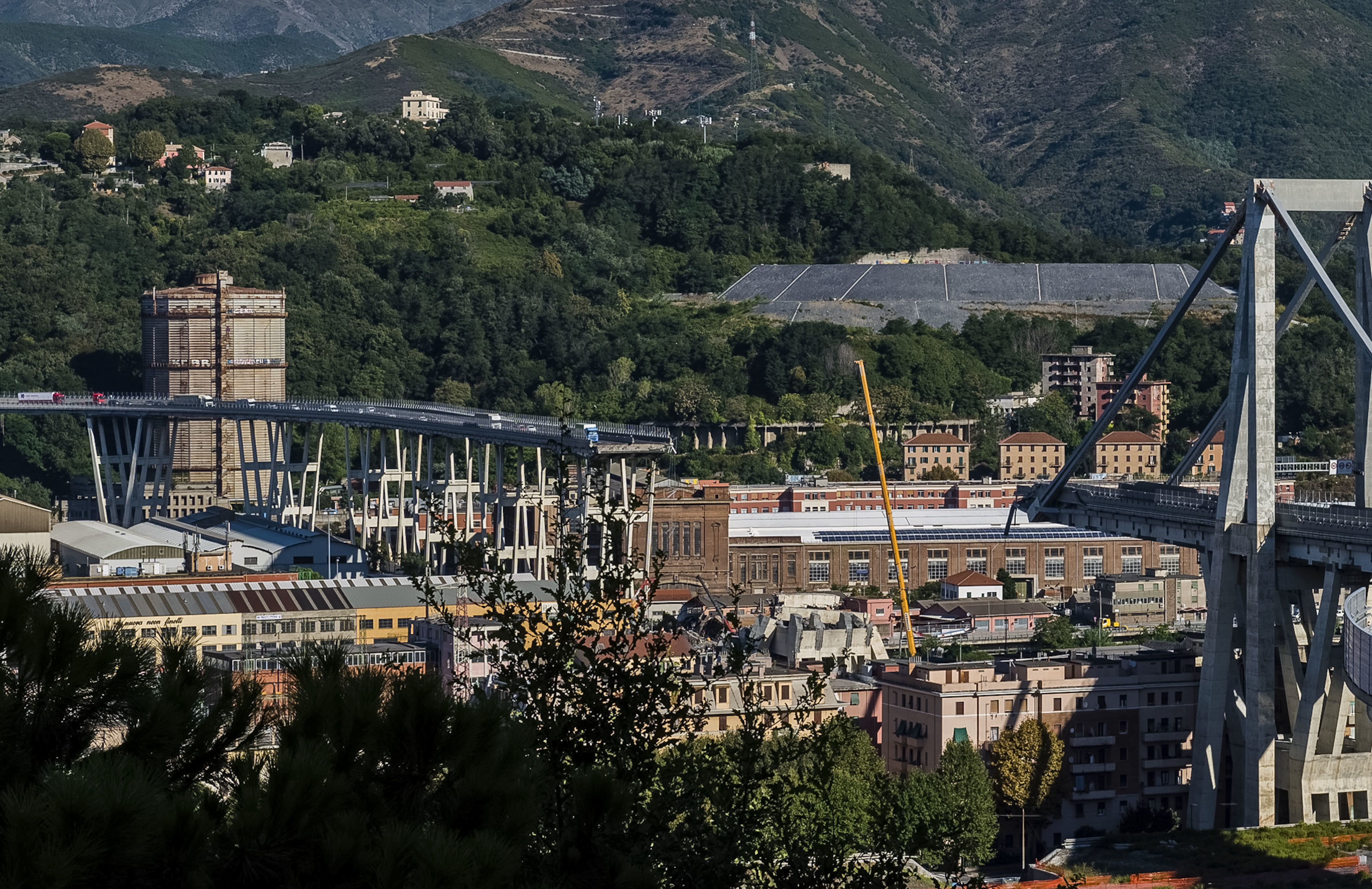 Italy hunts for blame in bridge collapse that killed 39
