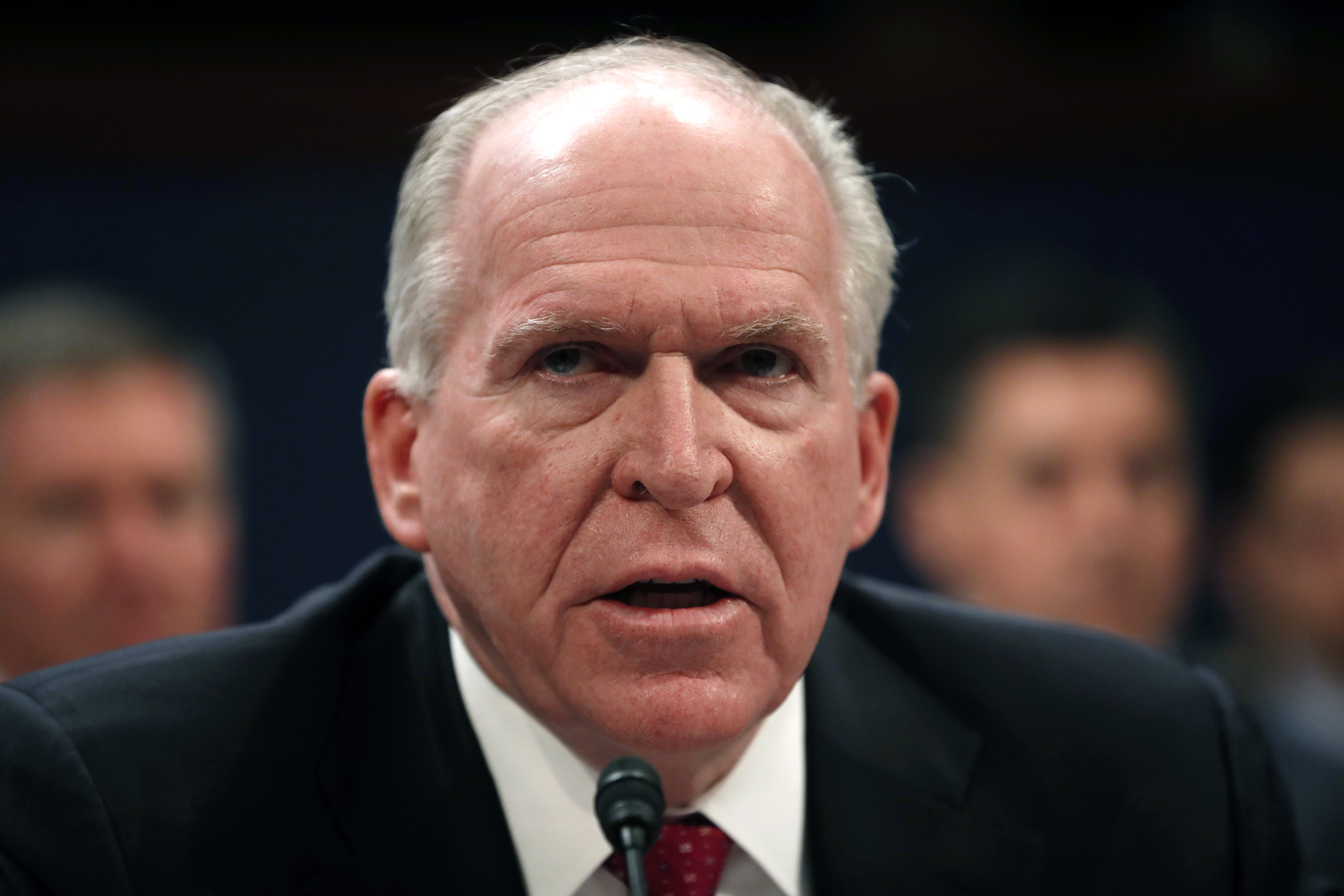 The Latest: Trump connects Russia probe, action on Brennan