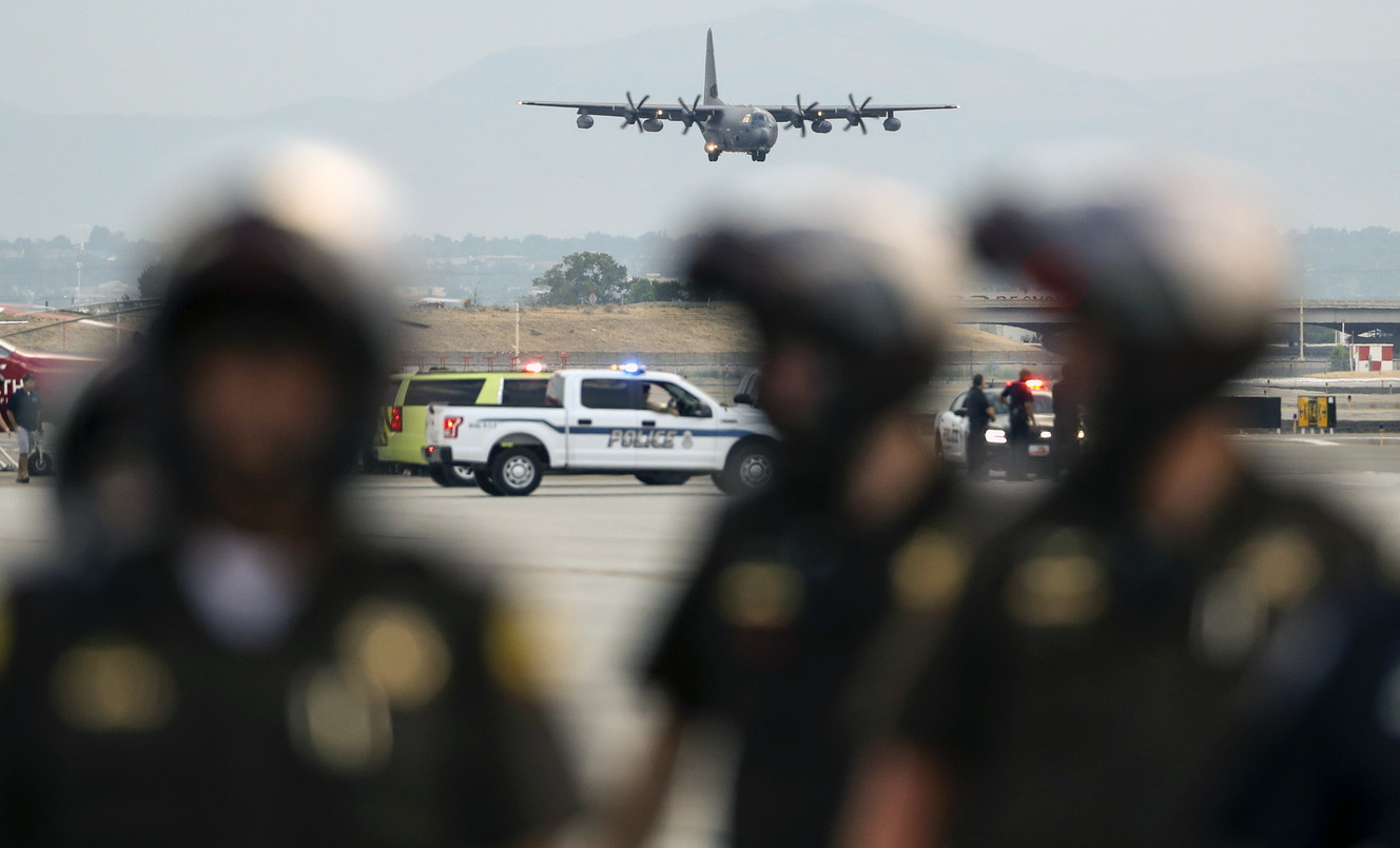 A C130-J carrying the casket of Draper Battalion Chief Matt Burchett prepares to land at the Utah Air National Guard Base in Salt Lake City on Wednesday, Aug. 15, 2018. Burchett was killed while fighting the Mendocino Complex Fire north of San Francisco. (Photo: Steve Griffin, KSL)