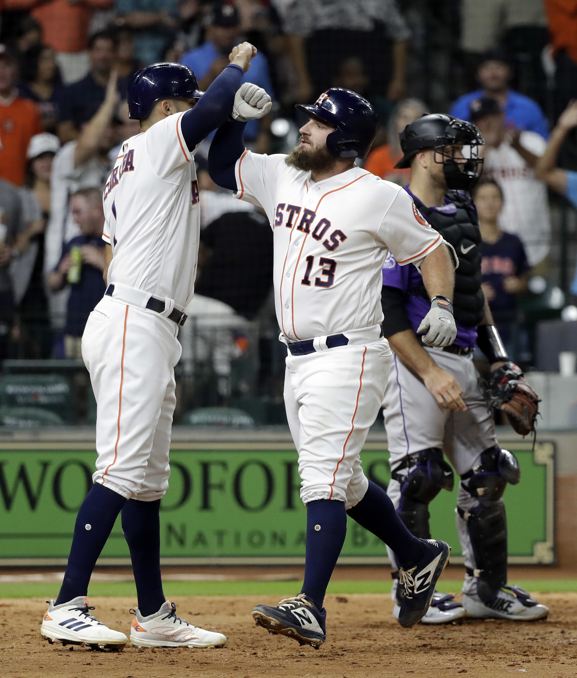 Astros hit 5 homers to end skid with 12-1 win over Rockies