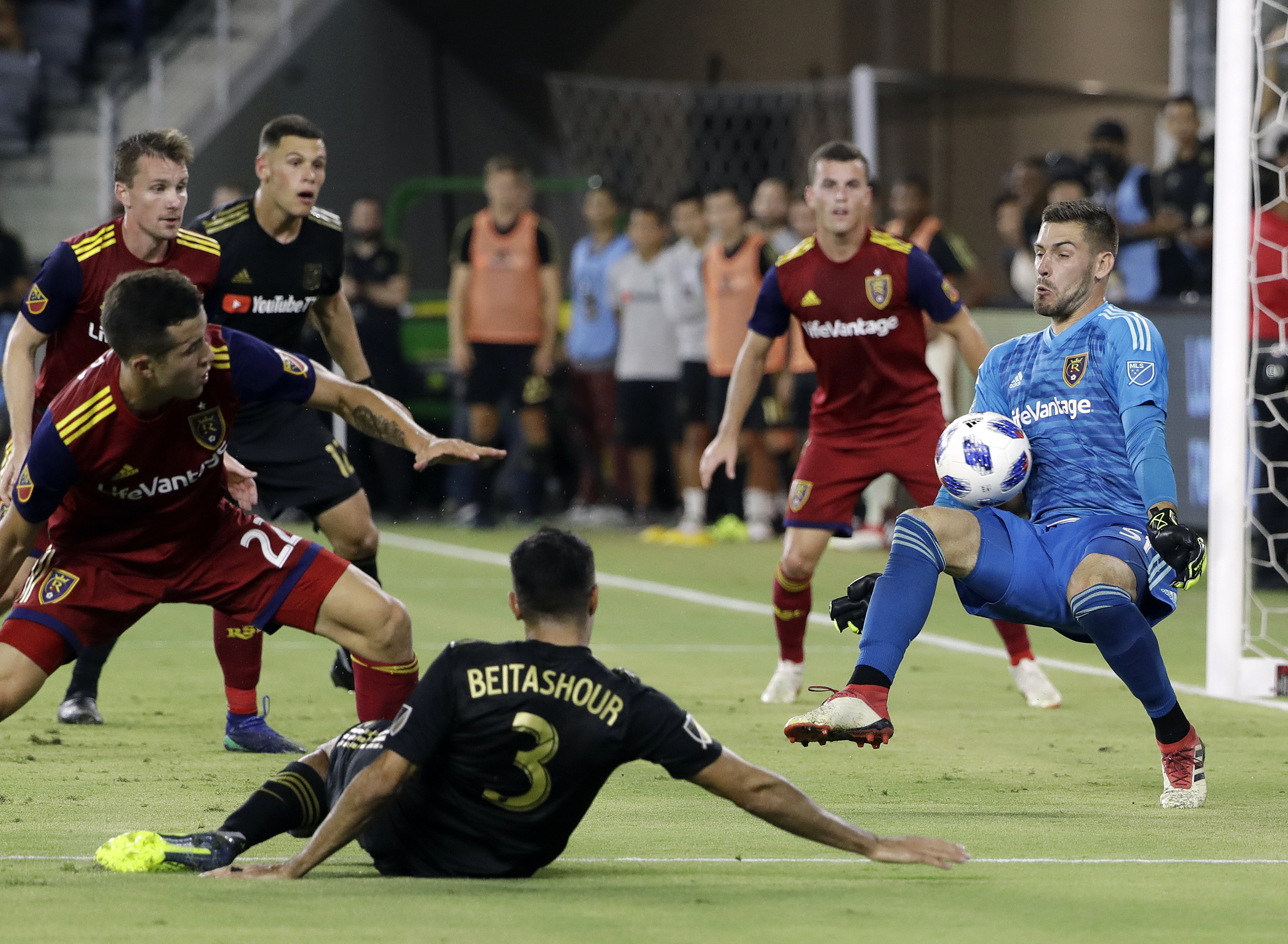 Real Salt Lake goalkeeper Andrew Putna, right, stops a shot by Los Angeles FC defender Steven Beitashour (3) during the second half of an MLS soccer match Wednesday, Aug. 15, 2018, in Los Angeles. (Photo: Marcio Jose Sanchez, AP)