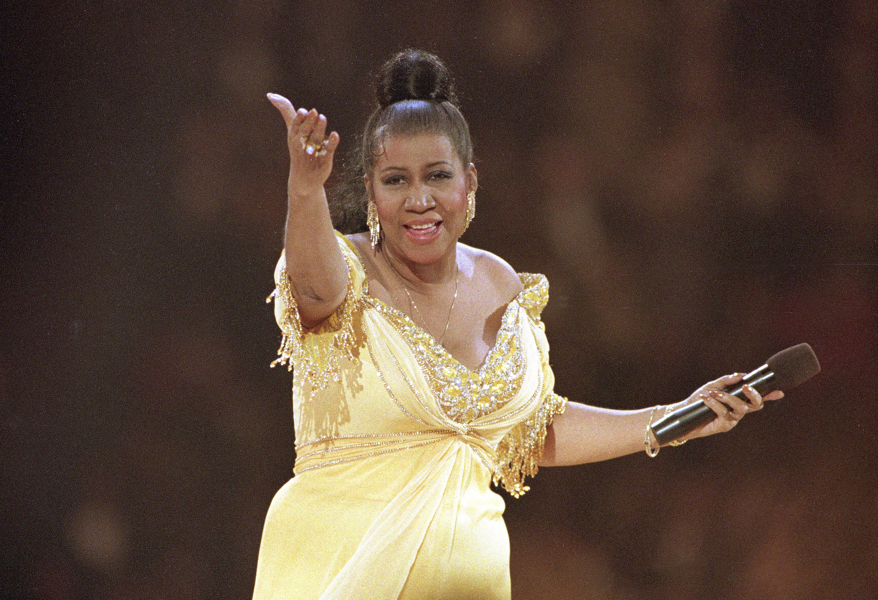 In this Jan. 19, 1993 file photo, singer Aretha Franklin performs at the inaugural gala for President Bill Clinton in Washington. Franklin died Thursday, Aug. 16, 2018 at her home in Detroit. She was 76. (AP Photo/Amy Sancetta, File)