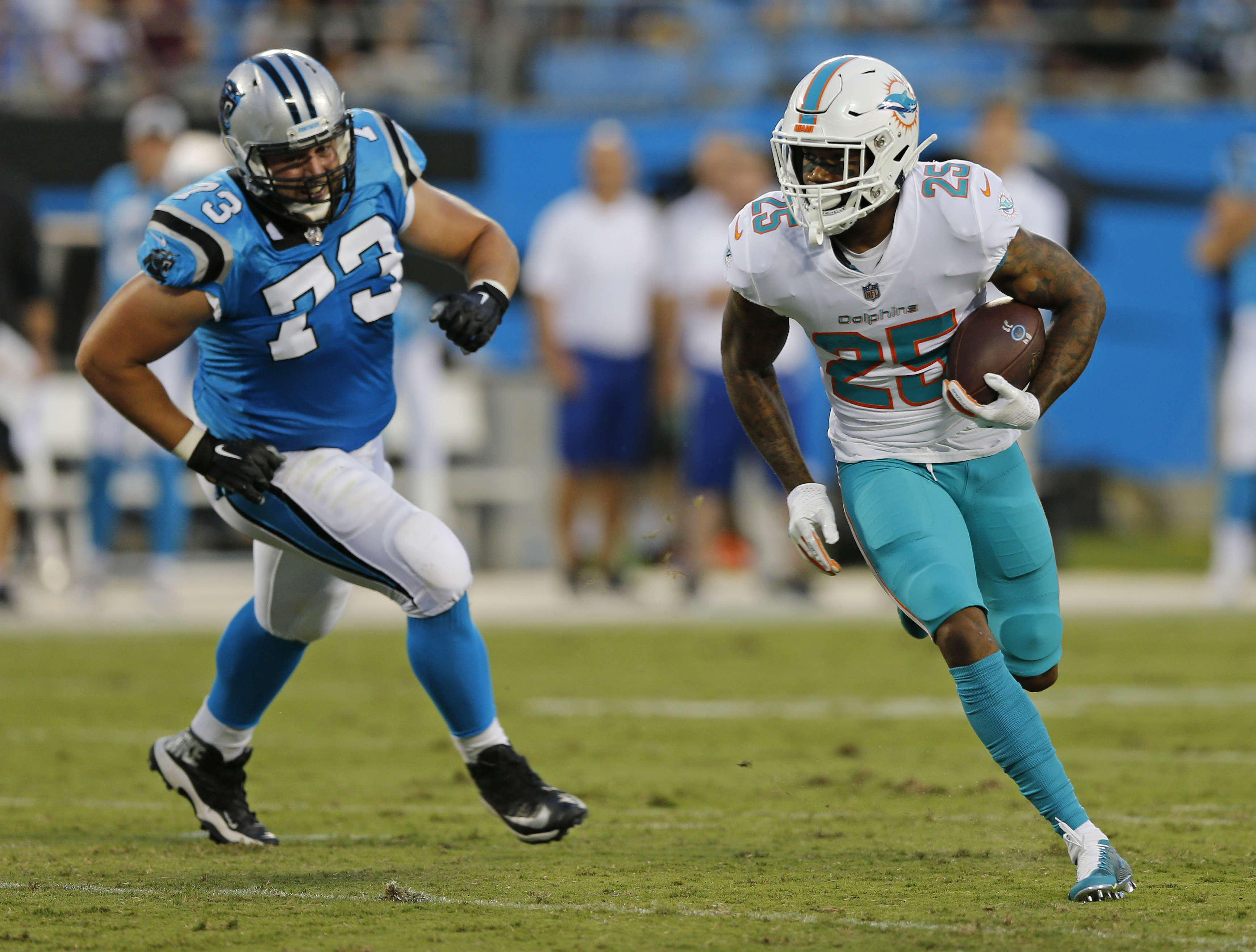McCaffrey's run highlights Panthers' 27-20 win over Dolphins