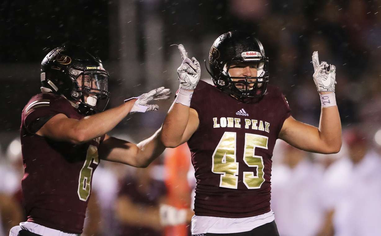 Lone Peak's Michael Daley celebrates after a tackle as Lone Peak and Herriman open the 2018-19 football season at Lone Peak on Friday, Aug. 17, 2018. (Photo: Scott G Winterton, Deseret News)