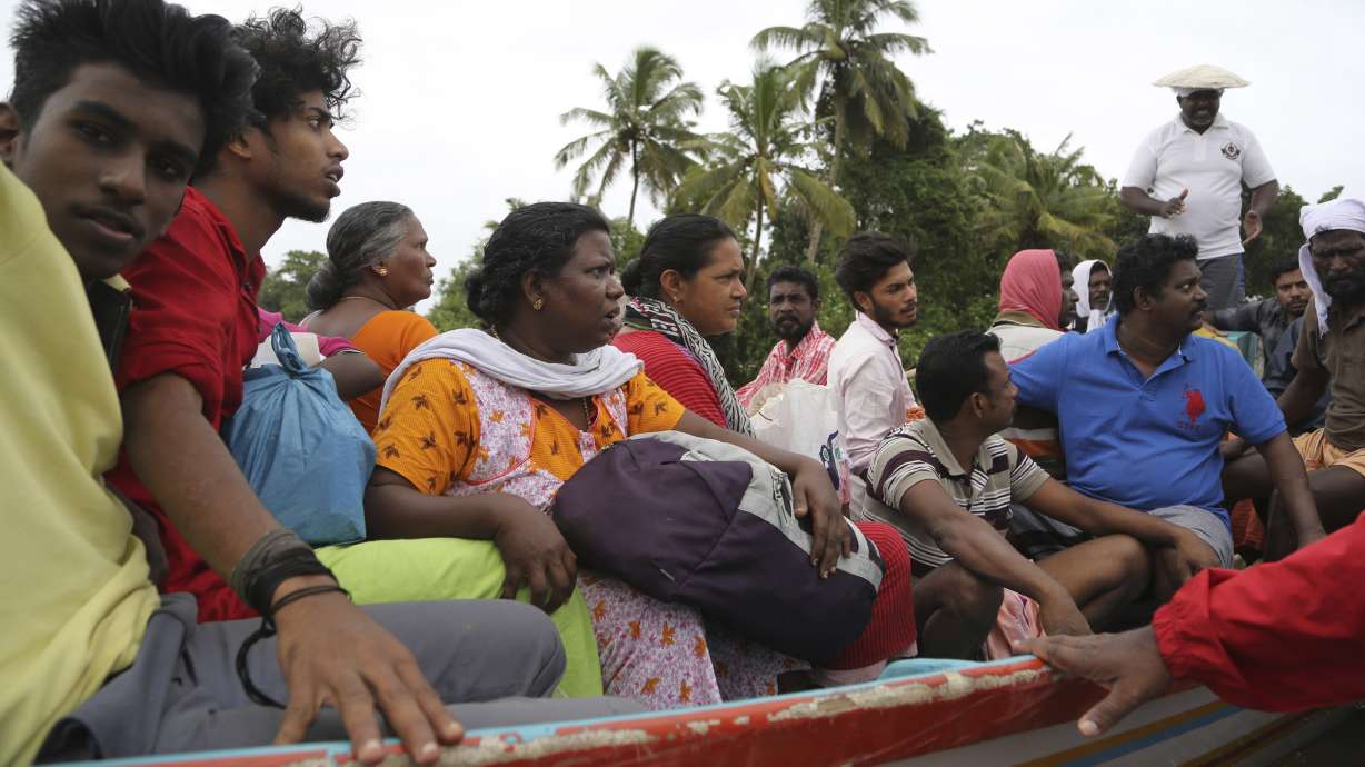 Indians begin massive cleanup as rains diminish in Kerala