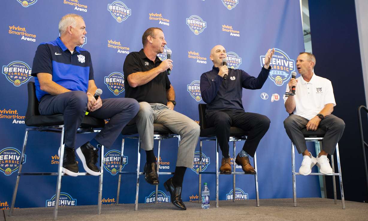 Head coaches Dave Rose, BYU, Larry Krystkowiak, Utah, Craig Smith, Utah State, and Randy Rahe, Weber State, team up to promote the Beehive Classic at a press conference at Vivint Smart Home Arena in Salt Lake City on Tuesday, Aug. 21, 2018. (Photo: Scott G Winterton, KSL)