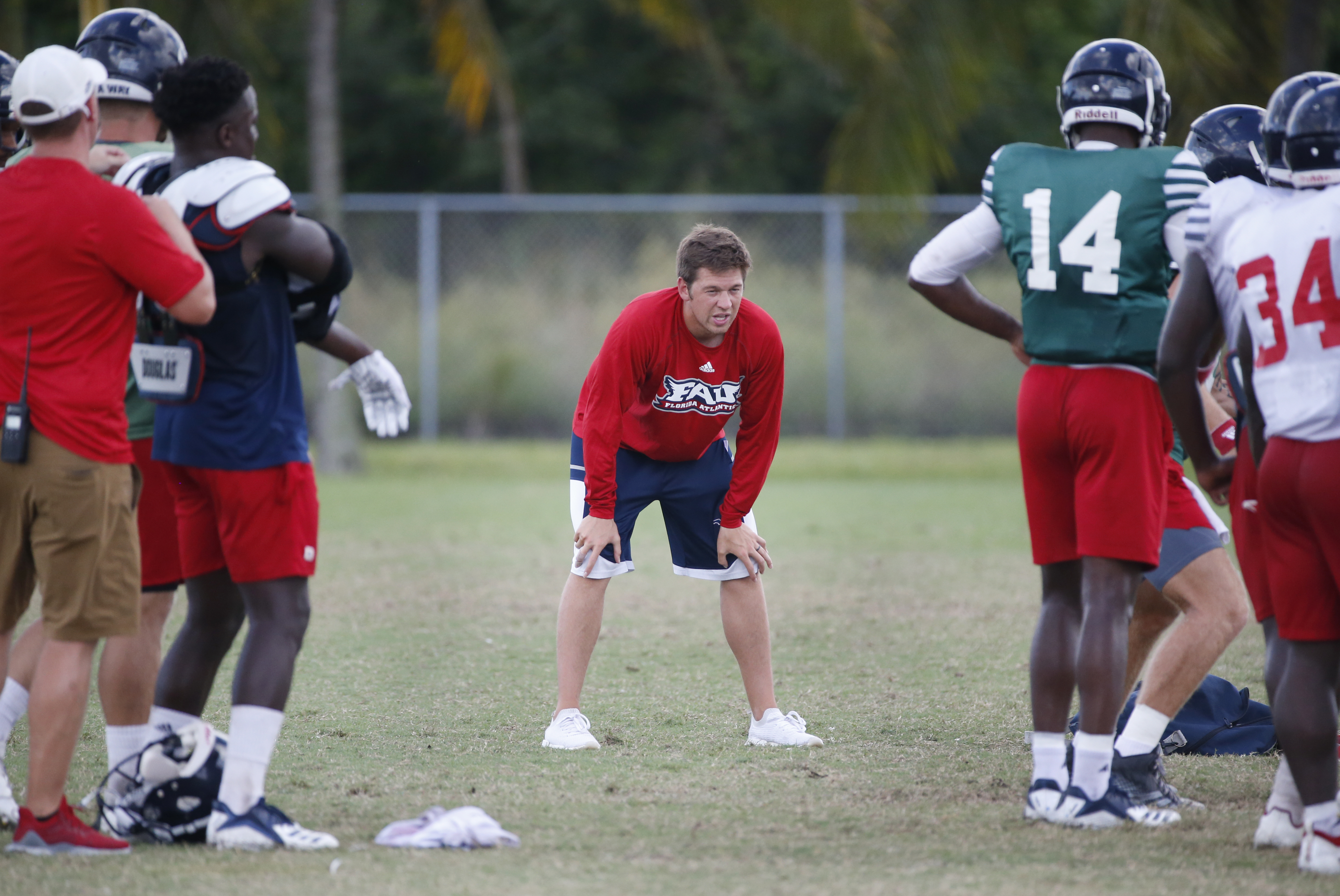 Youth is served: Weis Jr., 25, stands with Kiffin at FAU