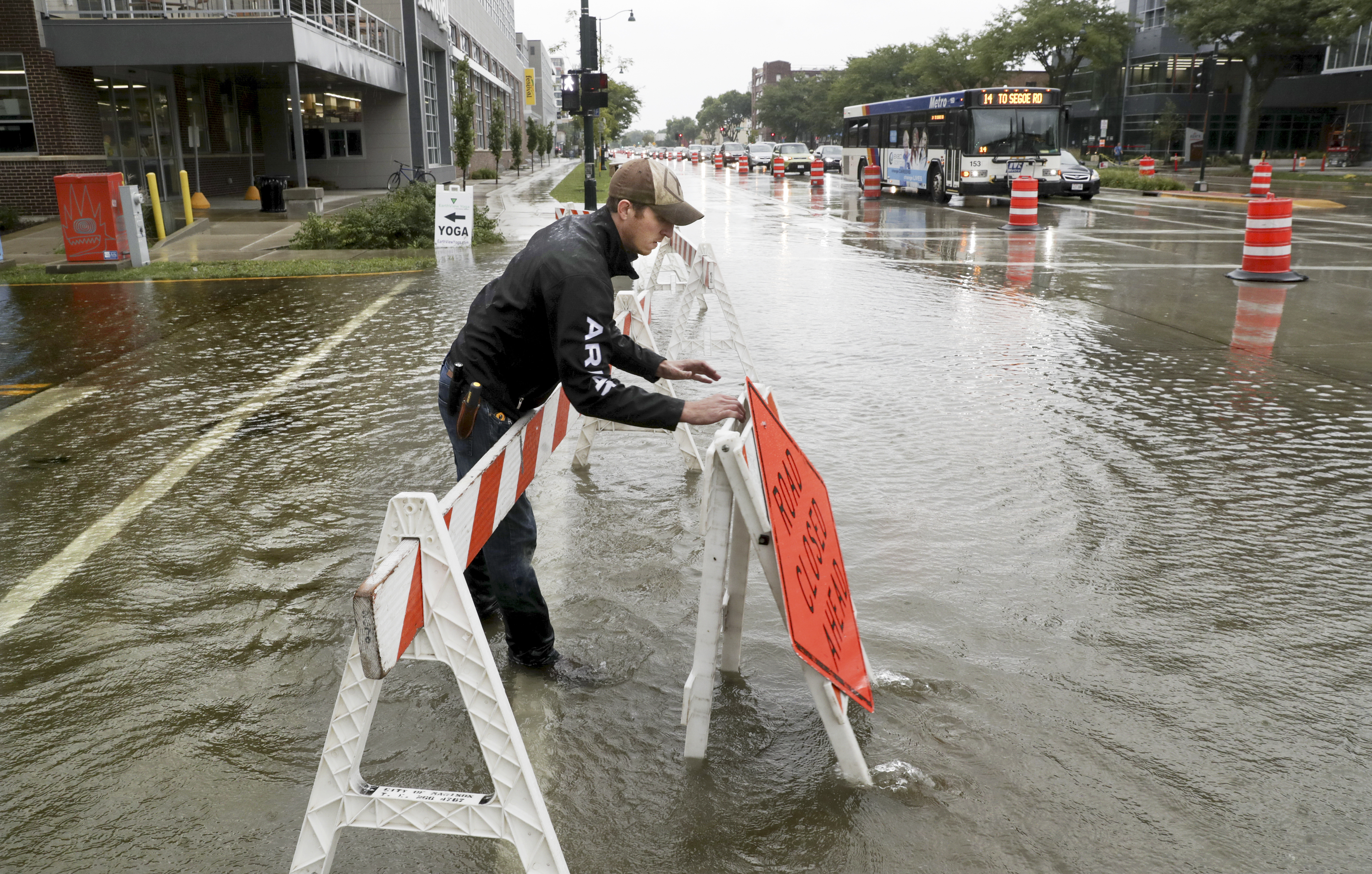 The Latest: Madison officials warn of flood evacuations