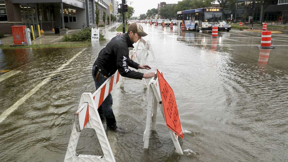 The Latest: Madison officials warn of flood evacuations