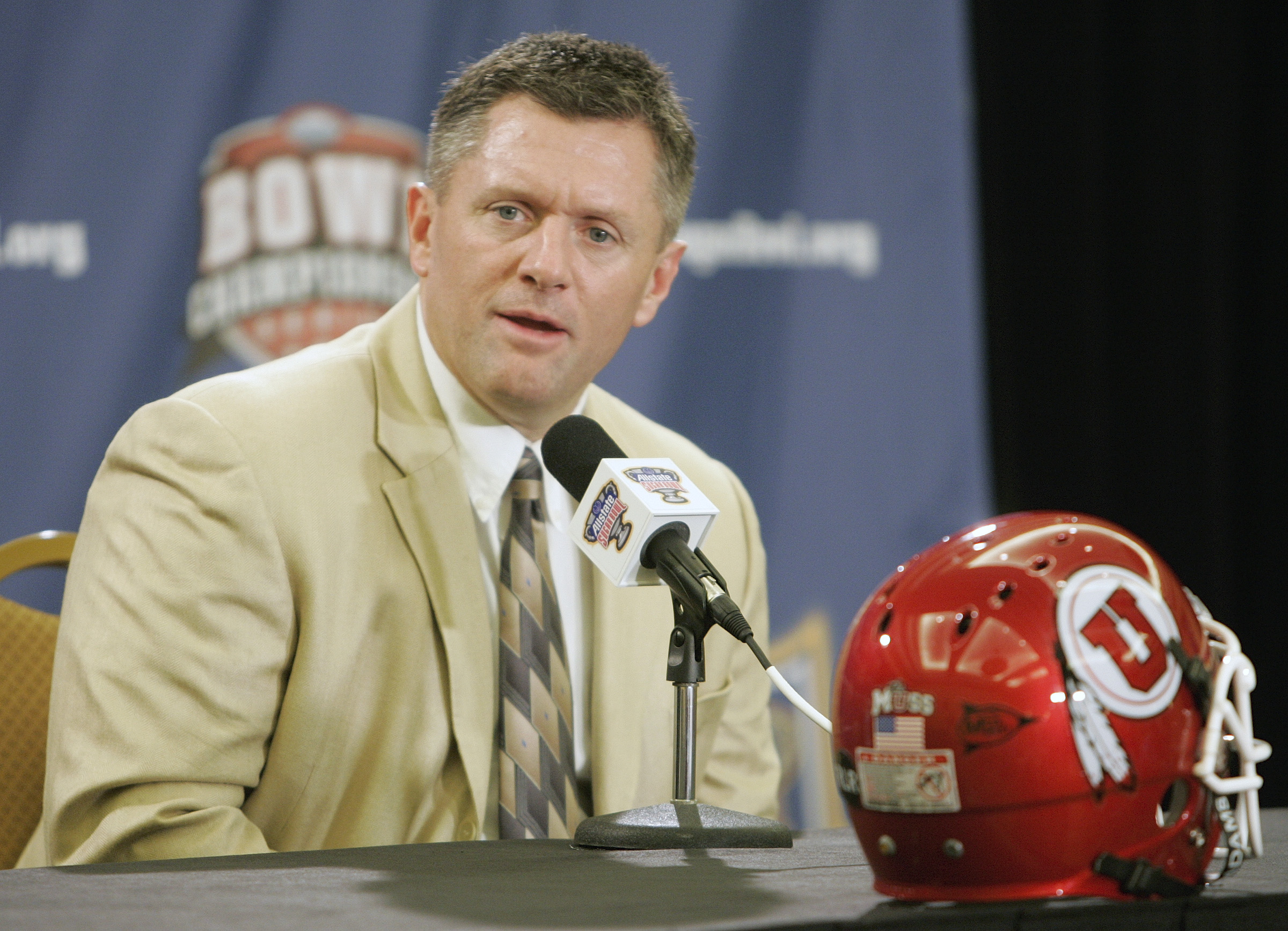 Utah head coach Kyle Whittingham addresses media at a press conference ahead of the 2009 Sugar Bowl — a matchup between Utah and Alabama. (Photo: Bill Haber, AP Photo, File)