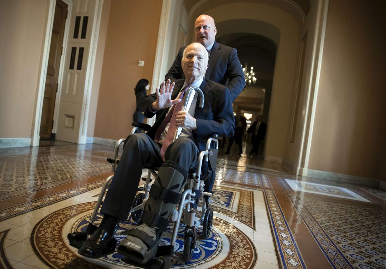 FILE - In this Dec. 1, 2017, file photo, Sen. John McCain, R-Ariz., leaves a closed-door session on Capitol Hill in Washington, where Republican senators met on the GOP effort to overhaul the tax code. Arizona Sen. McCain, the war hero who became the GOP's standard-bearer in the 2008 election, has died. He was 81. His office says McCain died Saturday, Aug. 25, 2018. He had battled brain cancer. (AP Photo/J. Scott Applewhite, File)
