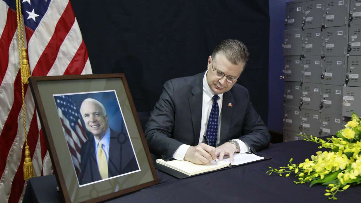 The Latest: Makeshift memorials for McCain grow in Phoenix