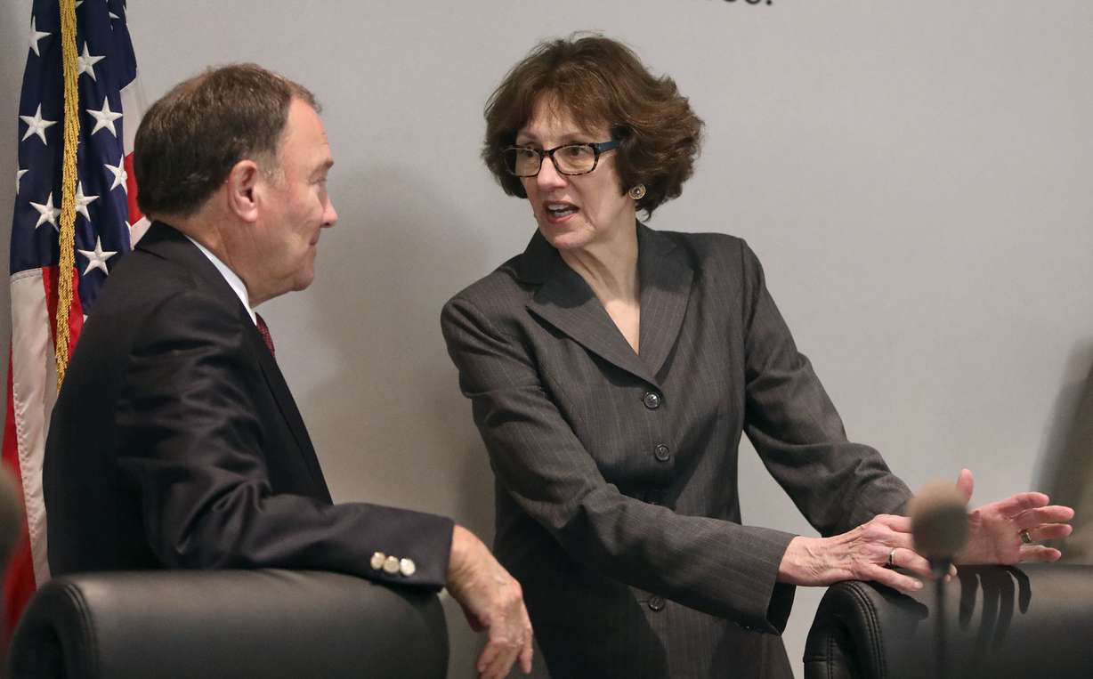 Utah Gov. Gary Herbert and Susan Combs, Interior Department's acting assistant secretary for policy, management and budget, talk before a roundtable discussion at the Ogden-Weber Chamber of Commerce in Ogden, Utah, on Tuesday, Aug. 28, 2018. (Kristin Murphy/The Deseret News via AP)