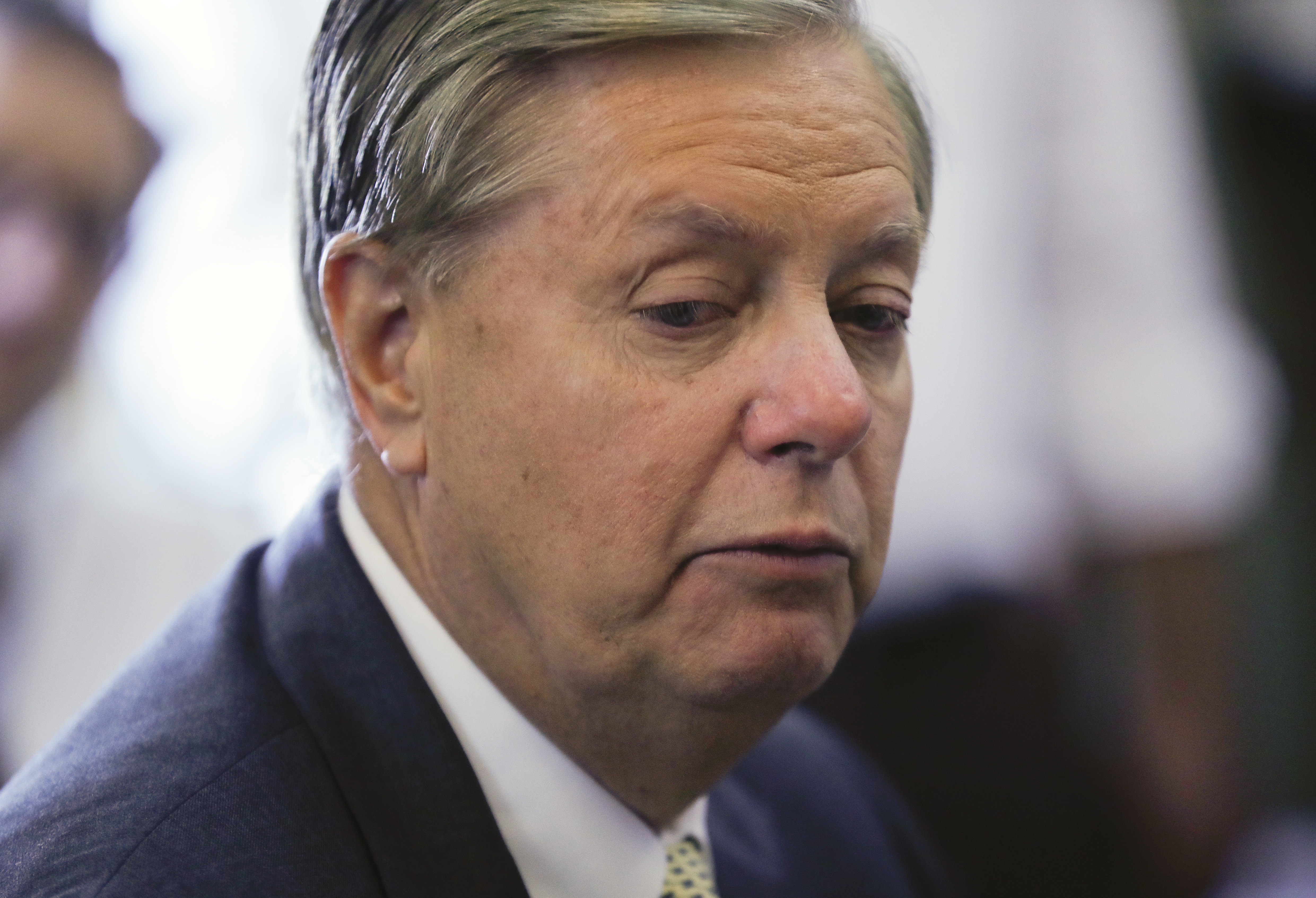 Graham recalls friend McCain with laughter, tears