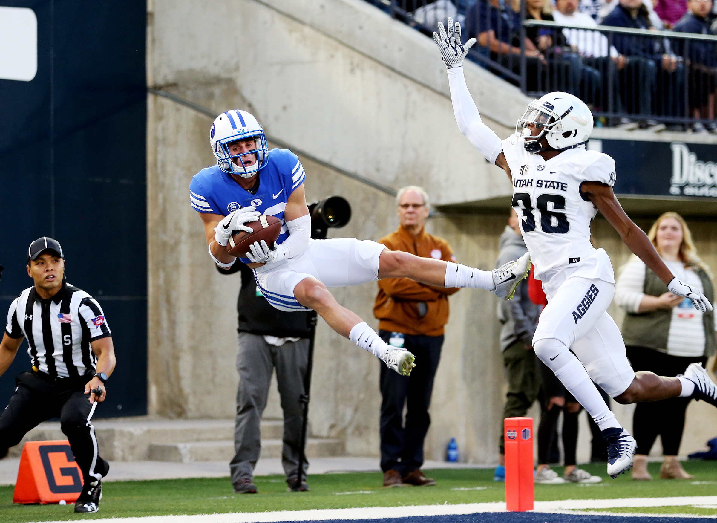 BYU wide receiver Beau Tanner (33) makes a leaping catch for a touchdown as BYU and USU play at Maverik Stadium in Logan Utah on Friday, Sept. 29, 2017. (Photo: Scott G Winterton, Deseret News)