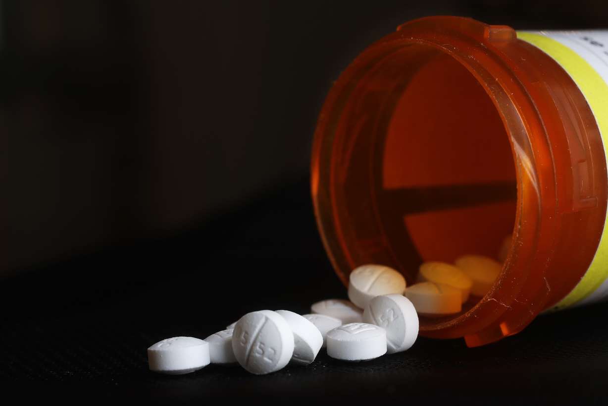 This Wednesday, Aug. 29, 2018 photo shows an arrangement of Oxycodone pills in New York. A study in Tennessee released on Thursday, Aug 30, 2018, found learning disabilities and other special education needs are more common in young children who were born with symptoms from their mothers' prenatal opioid use. The results bolster evidence of long-term consequences for infants caught in the nation's opioid epidemic. (AP Photo/Mark Lennihan)