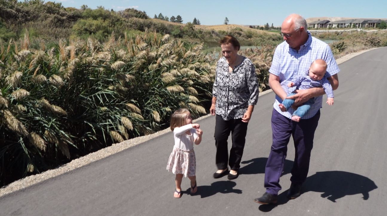Mike and Jennifer Hamilton try to stay active by going on walks behind their home. (Photo: KSL TV)