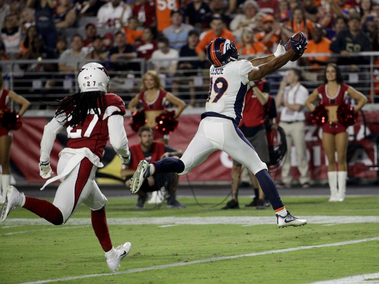Denver Broncos wide receiver Jordan Leslie scores past Arizona Cardinals defensive back Travell Dixon during the second half of a preseason NFL football game Thursday, Aug. 30, 2018, in Glendale, Ariz. (Photo: Rick Scuteri, AP)