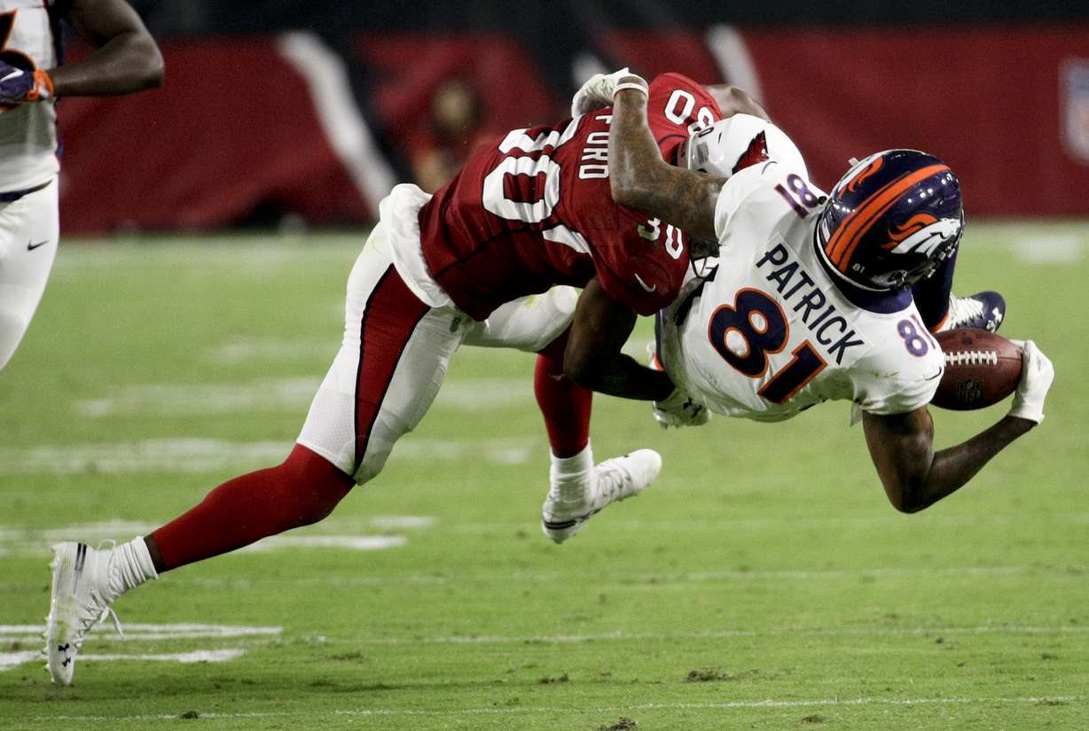 Denver Broncos wide receiver Tim Patrick, right, catches a pass under pressure from Arizona Cardinals defensive back Rudy Ford during the first half of a preseason NFL football game Thursday, Aug. 30, 2018, in Glendale, Ariz. (Photo: Rick Scuteri, AP)