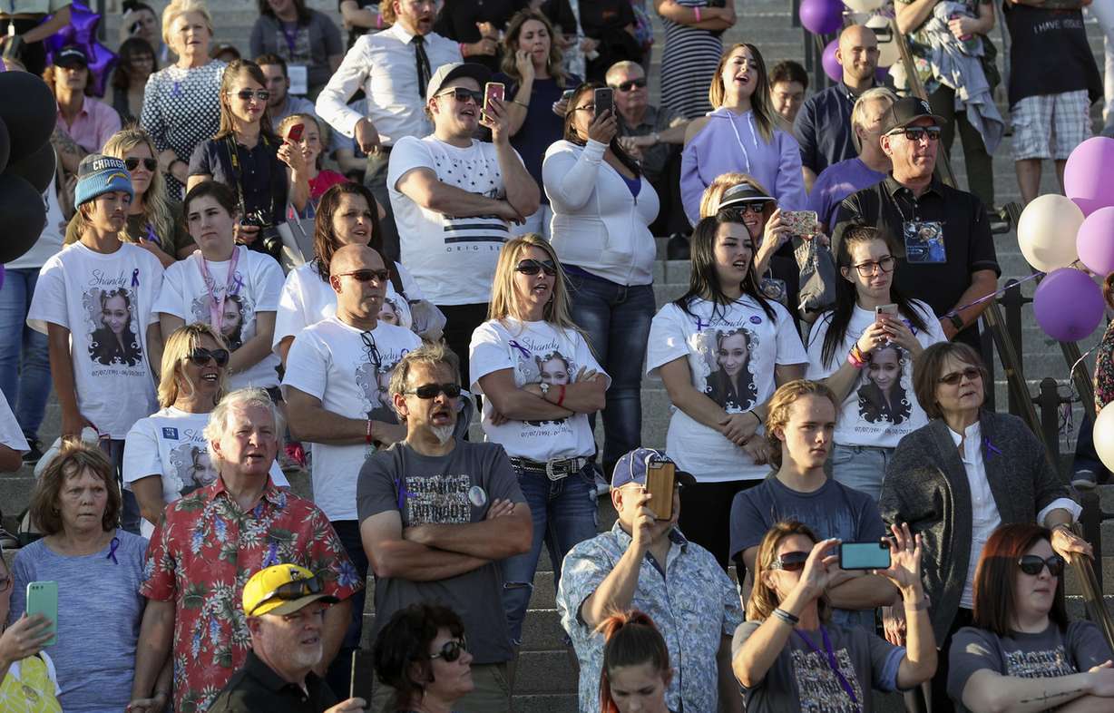 Family members of Shandy Olsen, center, stand for a moment of silence with other families who have lost people through overdose as Overdose Awareness Utah hosts an event for International Overdose Awareness Day at the Utah State Capitol in Salt Lake City on Friday, Aug. 31, 2018. Shandy Olsen died of an overdose on June 10, 2017. The global event is held on Aug. 31 each year and aims to raise awareness of overdose and reduce the stigma of a drug-related death. It also acknowledges the grief felt by families and friends remembering those who have died or had a permanent injury as a result of drug overdose. (Photo: Steve Griffin, KSL)