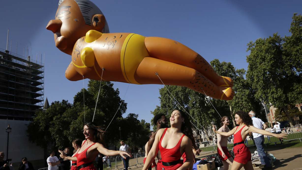 Balloon poking fun at Mayor Sadiq Khan flies over London
