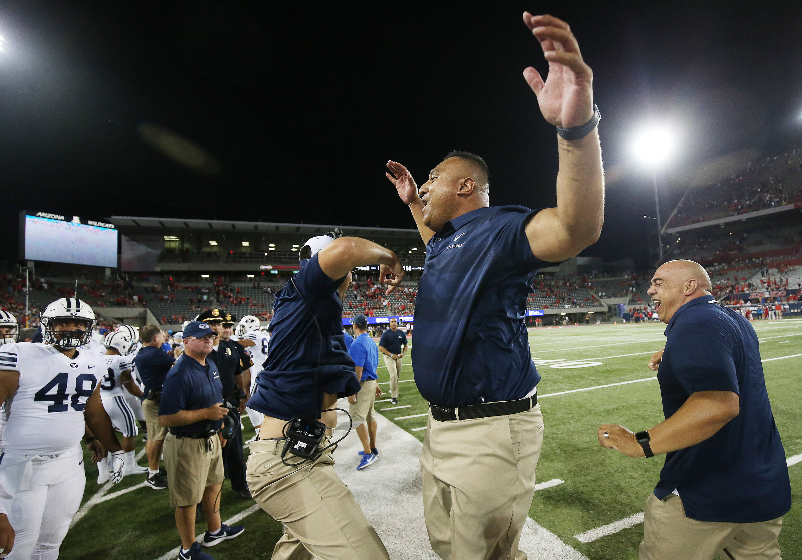 BYU coach Kalani Sitaki celebrates the win against the Arizona Wildcats in Tucson on Sunday, Sept. 2, 2018. (Photo: Jeffrey D. Allred, Deseret News)