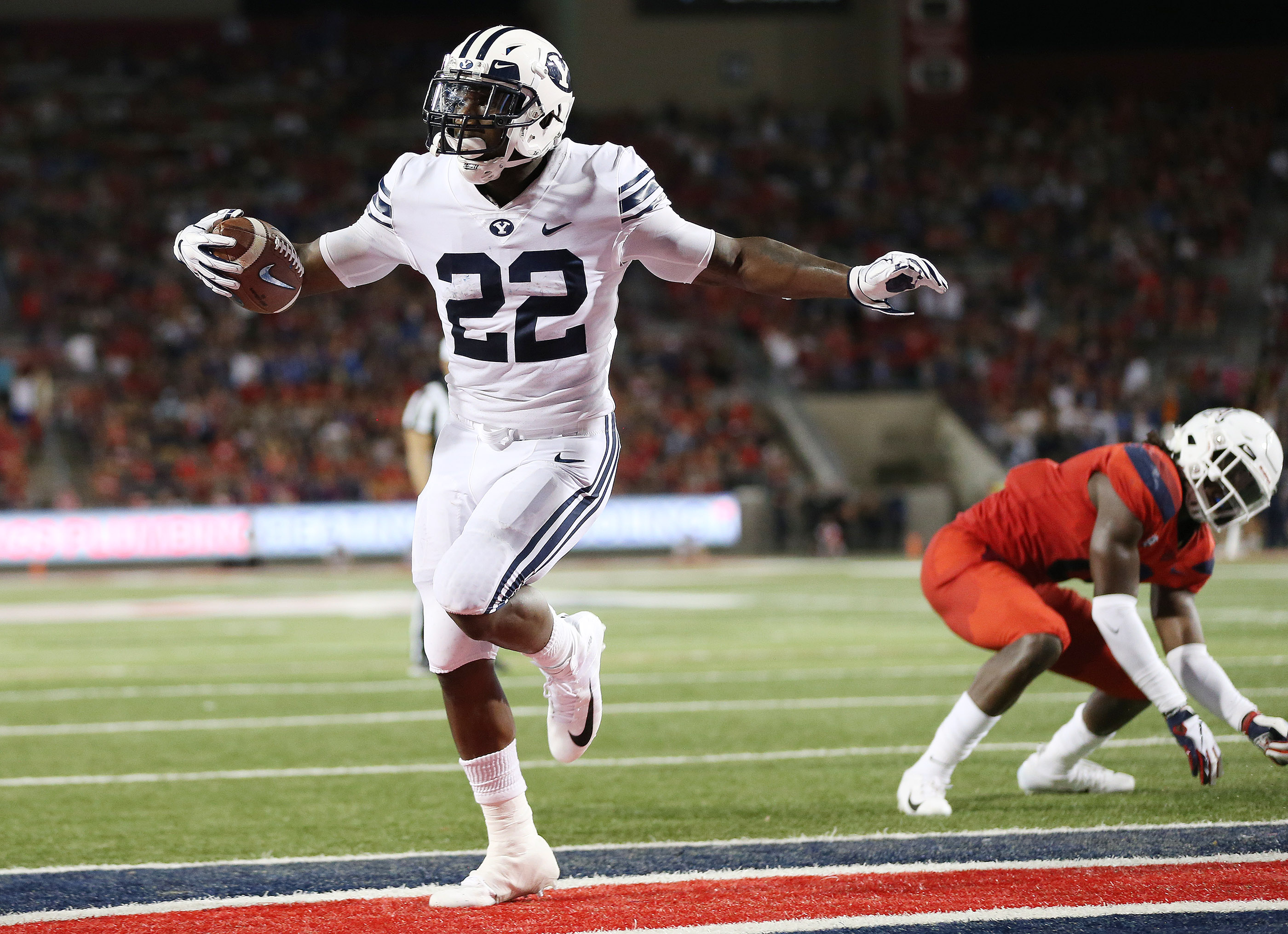 Brigham Young Cougars running back Squally Canada (22) scores against the Arizona Wildcats in Tucson on Saturday, Sept. 1, 2018. (Photo: Jeffrey D. Allred, Deseret News)