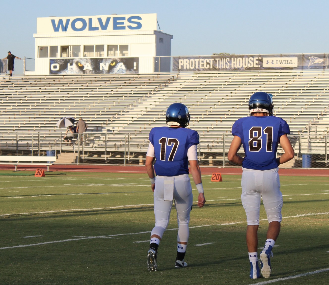 BYU quarterback commit Jacob Conover (17) and high school teammate wide receiver Jay McEuen (81) warm up before Chandler High's 62-0 win over visiting Mesa High, Friday, Aug. 31, 2018 in Chandler, Arizona.
