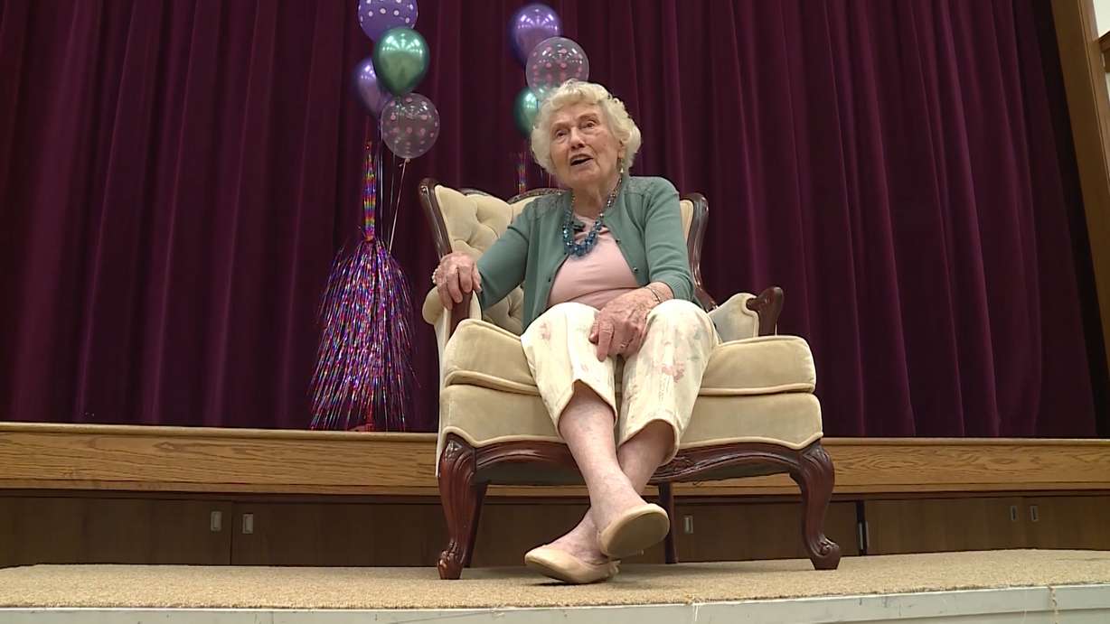 Springville centenarian Beth Walker talks with KSL's Tania Dean at the celebration of her 100th birthday Monday, Sep. 3, 2018. Walker's nearly 500 children, grandchildren, great-grandchildren and great-great-grandchildren gathered at a Springville church to celebrate with her. (Photo: Mark Wetzel, KSL TV)