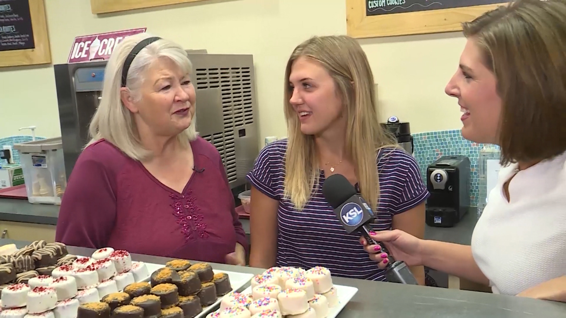 Debi Jensen and her granddaughter Sage talk with KSL's Caitlin Burchill at Swirly Girls Gourmet Bakery in South Jordan Monday, Sep. 3, 2018. The duo will soon be competing on a new Discovery Family show “Bake It Like Buddy.” (Photo: Derek Petersen, KSL TV)