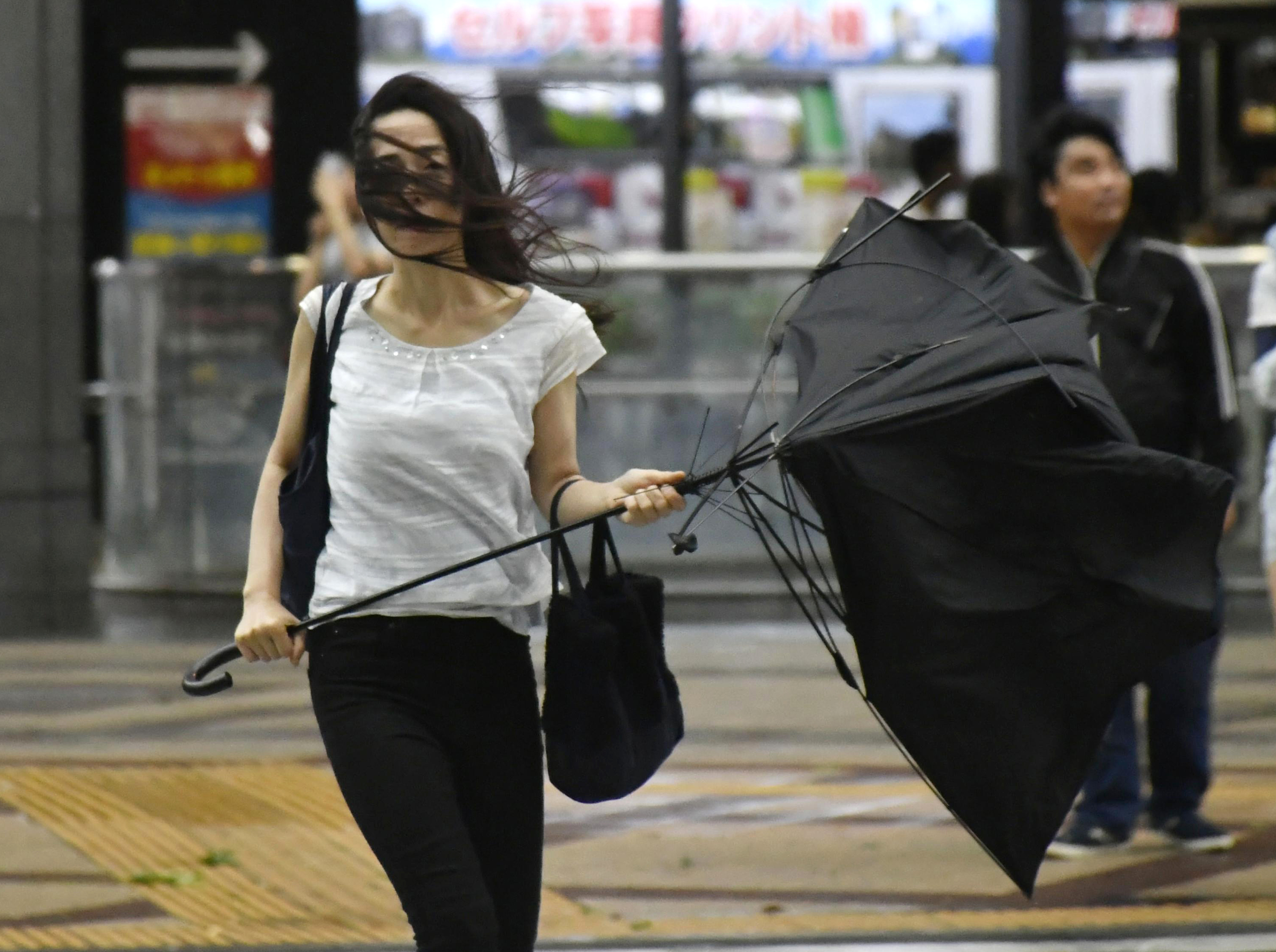 Typhoon leaves major airport closed and destruction in Japan