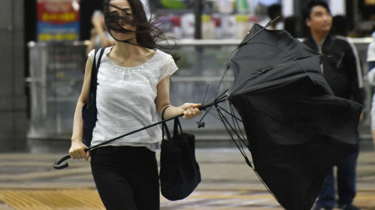 Typhoon leaves major airport closed and destruction in Japan