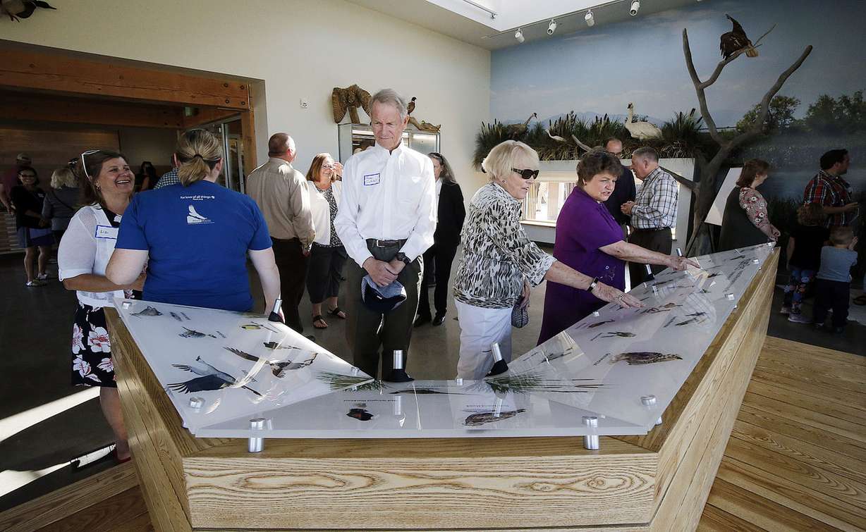 Visitors look at displays in the conservation hall as the Eccles Wildlife Education Center opens in Farmington on Wednesday, Sept. 5, 2018. (Photo: Ravell Call, KSL)