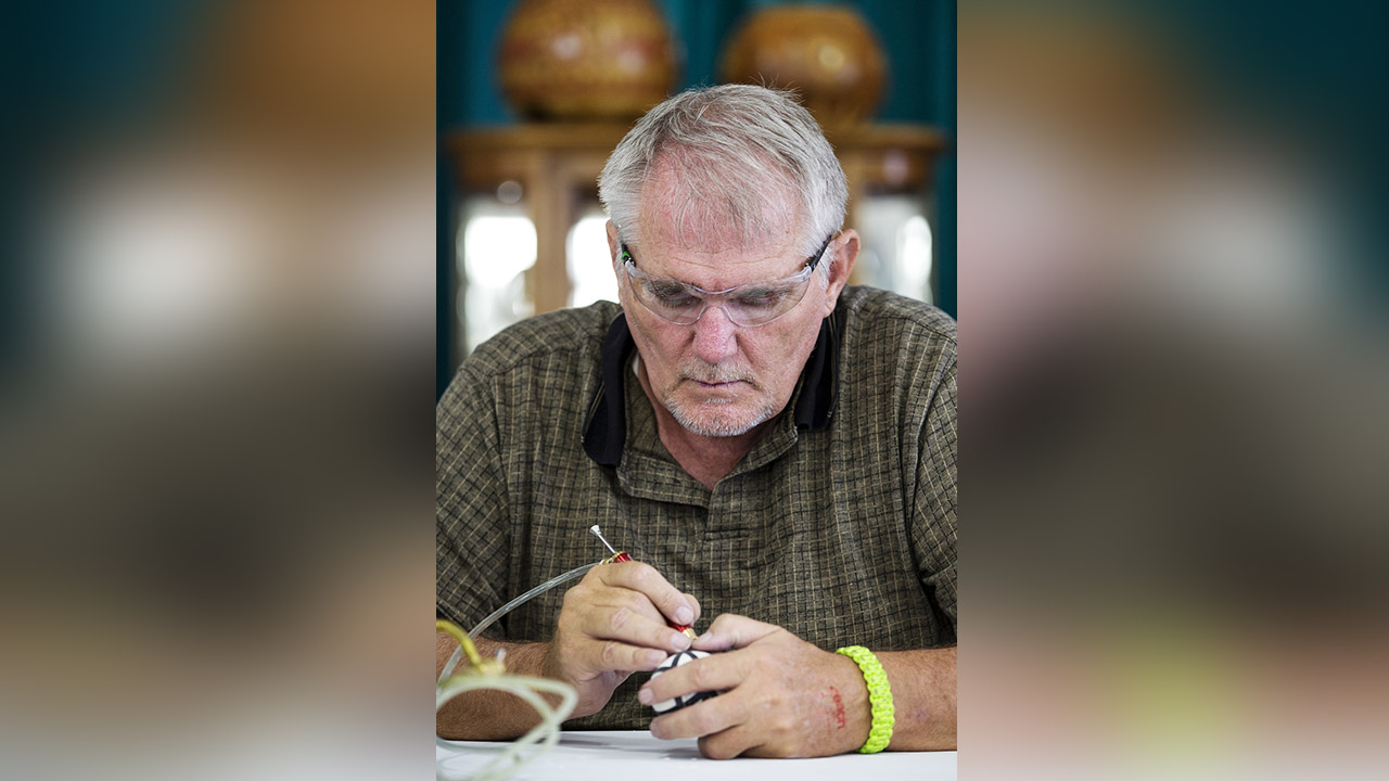 RK Winfree carves an goose egg on the opening day of the Utah State Fair at the Utah State Fairpark in Salt Lake City on Thursday, Sept. 6, 2018. (Photo: Qiling Wang, KSL)