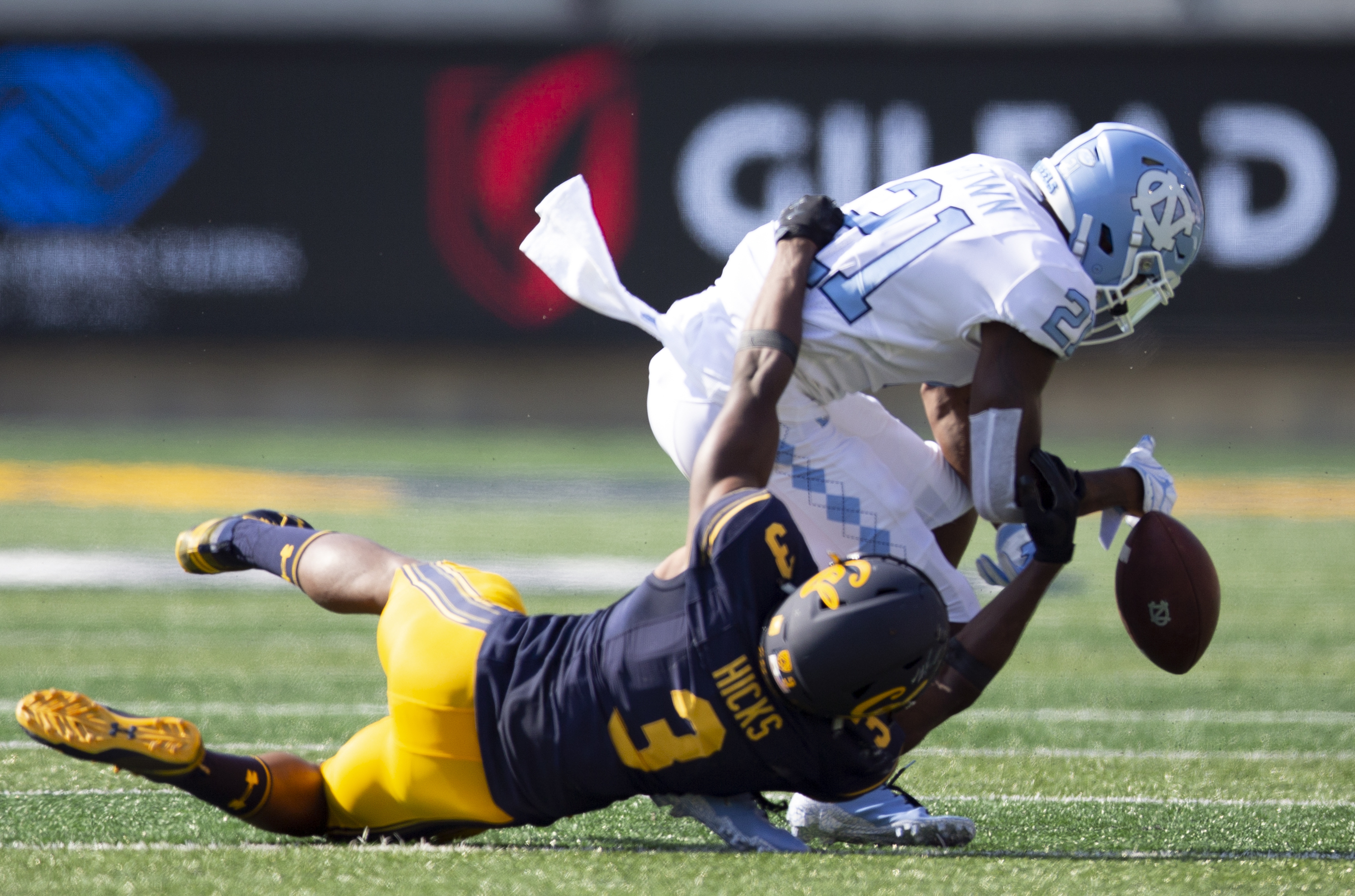 California's Elijah Hicks (3) breaks up a pass intended fro North Carolina wide receiver Dyami Brown (21) during the second half of an NCAA college football game, Saturday, Sept. 1, 2018, in Berkeley, Calif. Cal won 24-17. (AP Photo/D. Ross Cameron)