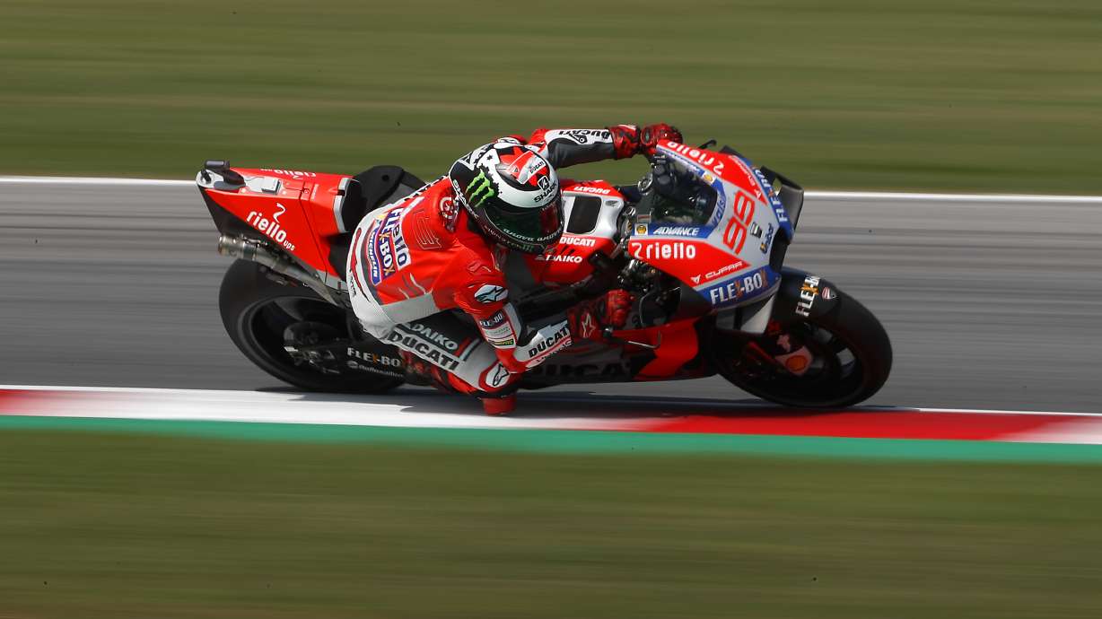 Lorenzo takes San Marino pole in record lap, Marquez crashes