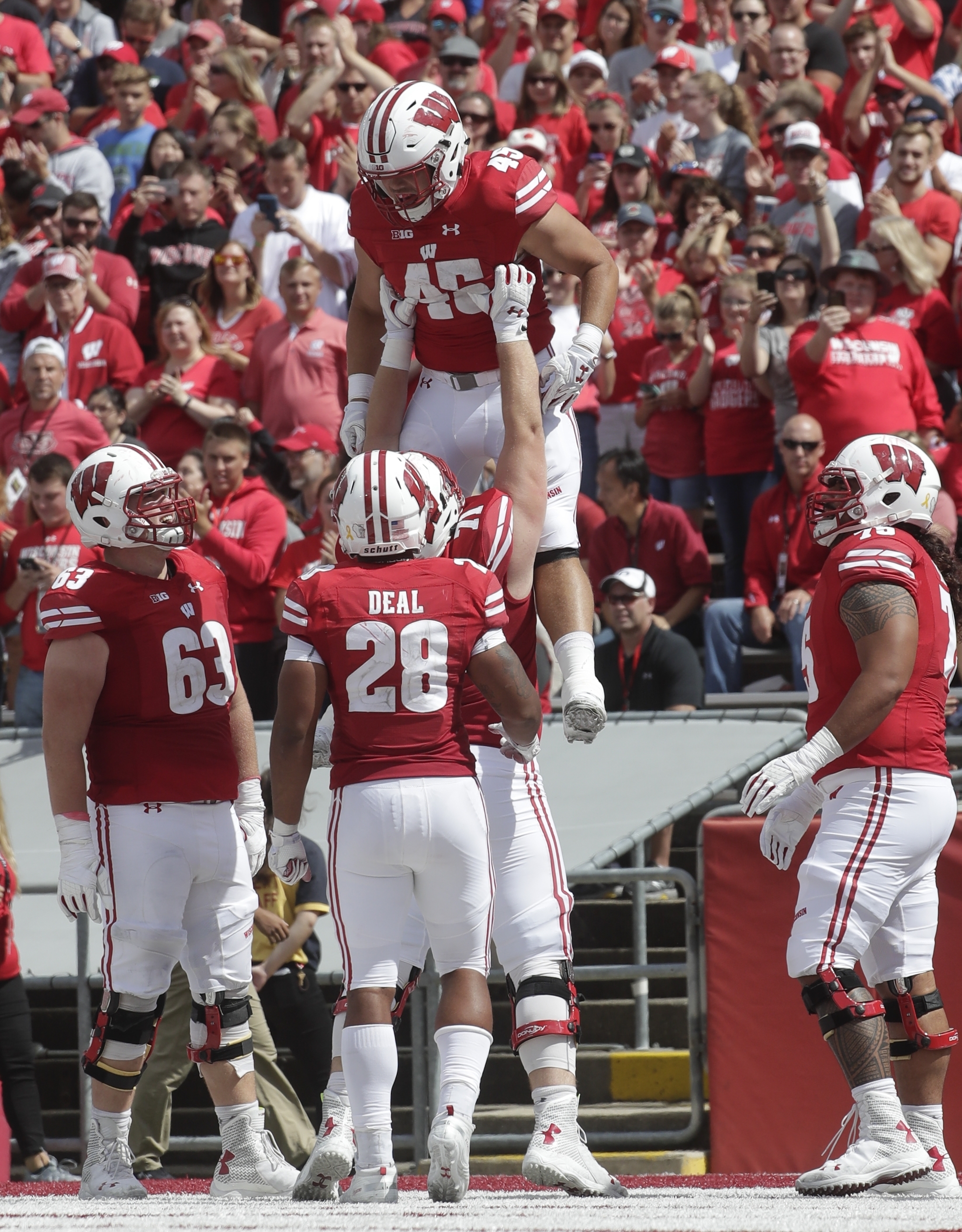 Wisconsin's Alec Ingold (45) is congratulated after a touchdown run during the second half of an NCAA college football game against New Mexico Saturday, Sept. 8, 2018, in Madison, Wis. Wisconsin won 45-14. (Photo: Morry Gash, AP)