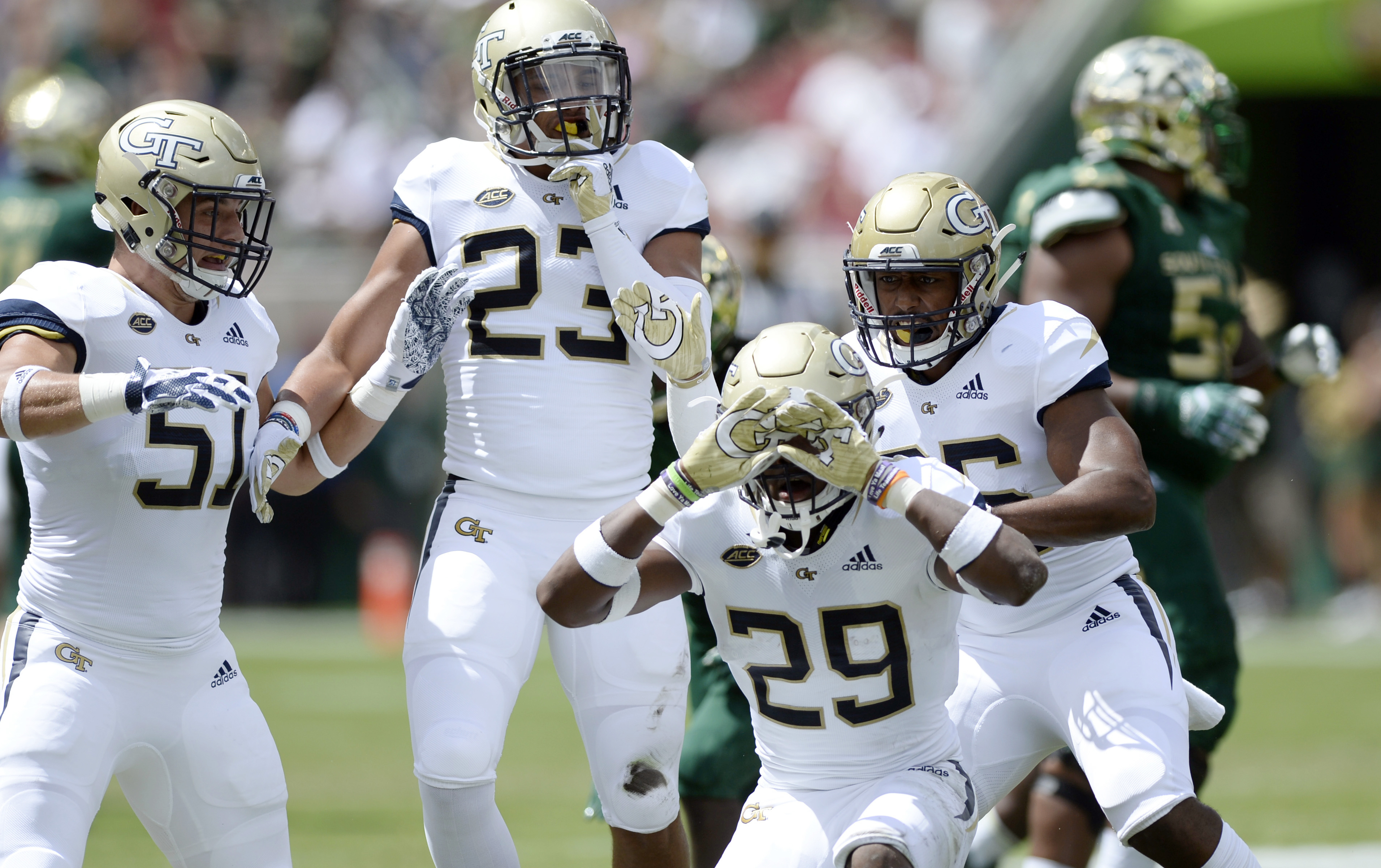 Barnett produces 4 TDs, helps USF beat Georgia Tech 49-38