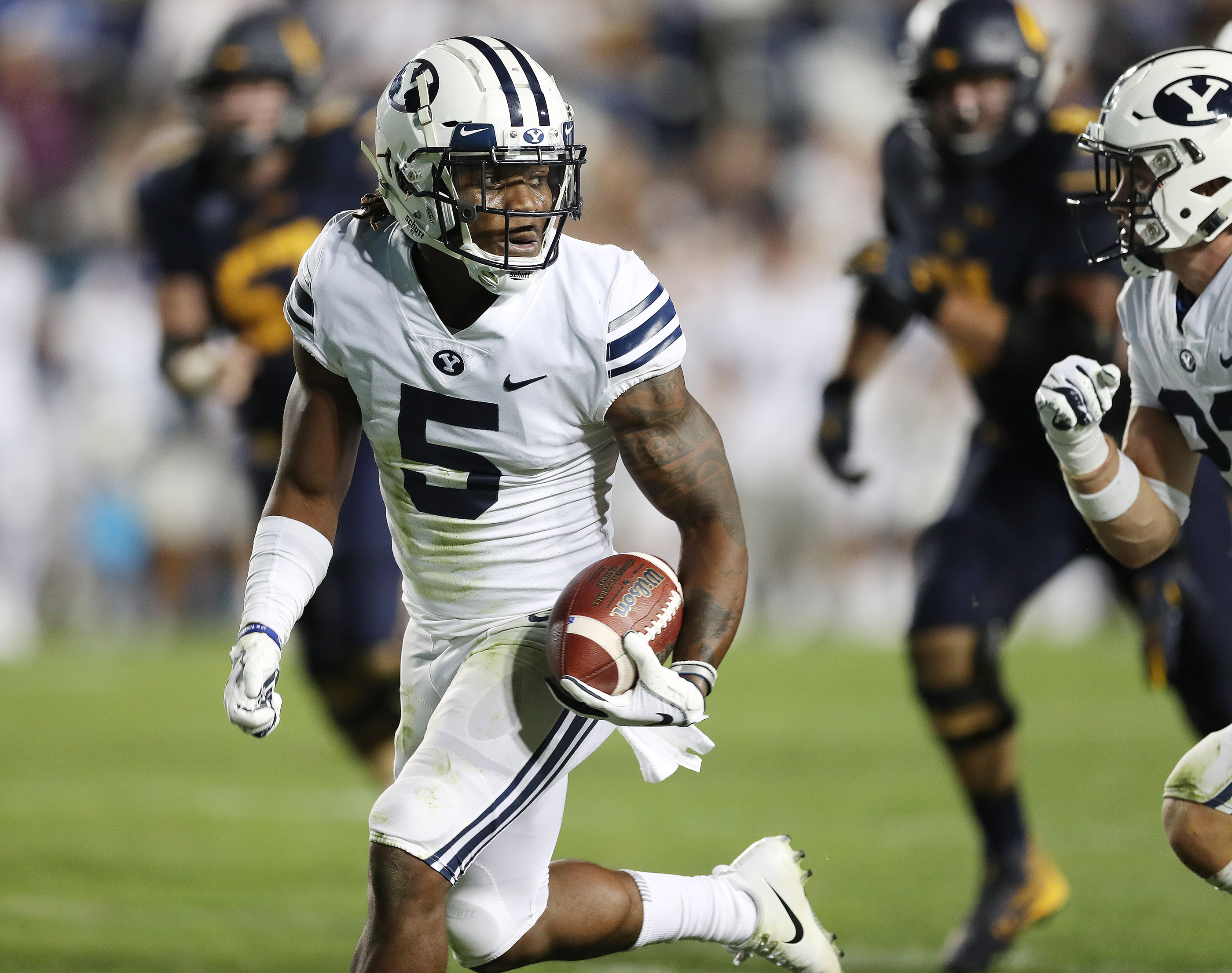 BYU defensive back Dayan Ghanwoloku (5) returns a fumble for touchdown against the California Golden Bears in Provo on Sunday, Sept. 9, 2018. BYU lost 31-28. (Photo: Jeffrey D. Allred, Deseret News)