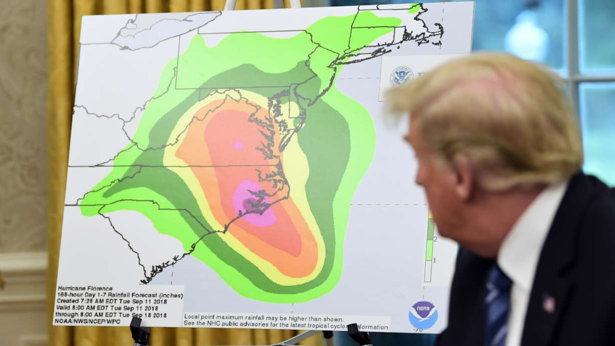 The Latest: Florence now a Category 2 storm, still dangerous