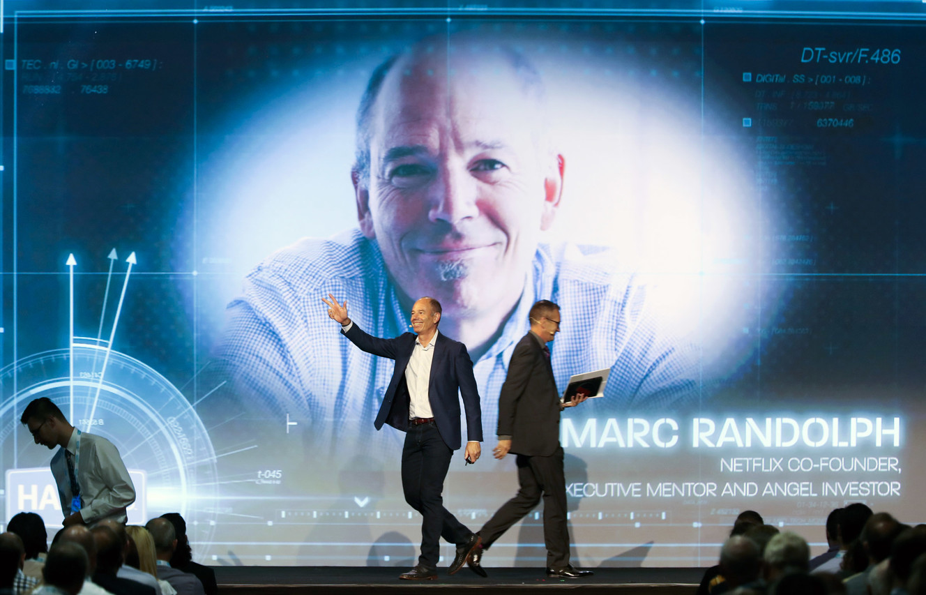 Marc Randolph, left, the co-founder and first CEO of Netflix, gives the keynote address at the Healthcare Analytics Summit, a conference about digital innovation and disruption in health care, at the Grand America Hotel in Salt Lake City on Wednesday, Sept. 12, 2018. (Photo: Steve Griffin, KSL)