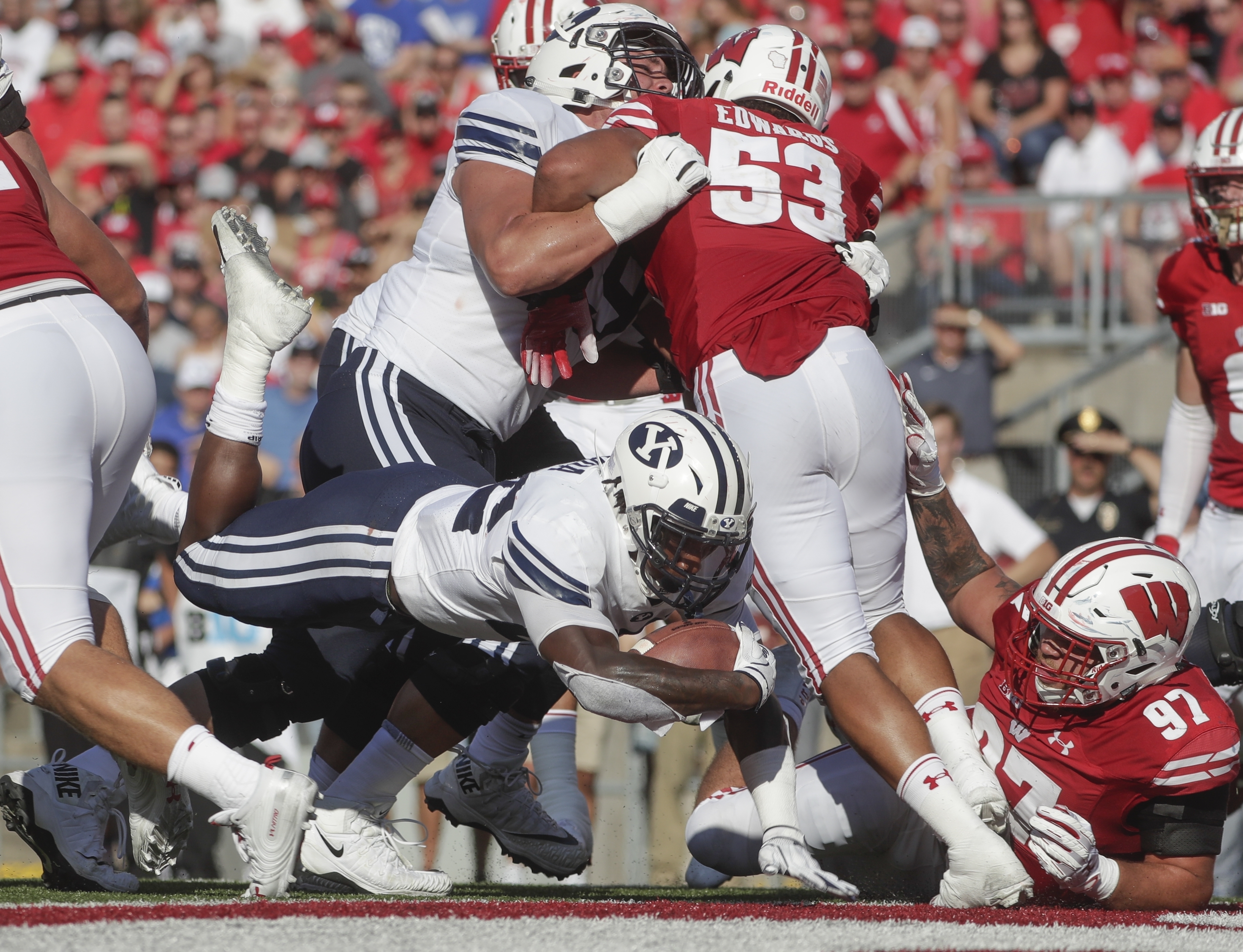 BYU's Squally Canada dives into the end zone for a touchdown during the second half of an NCAA college football game against Wisconsin Saturday, Sept. 15, 2018, in Madison, Wis. (Photo: Morry Gash, AP)