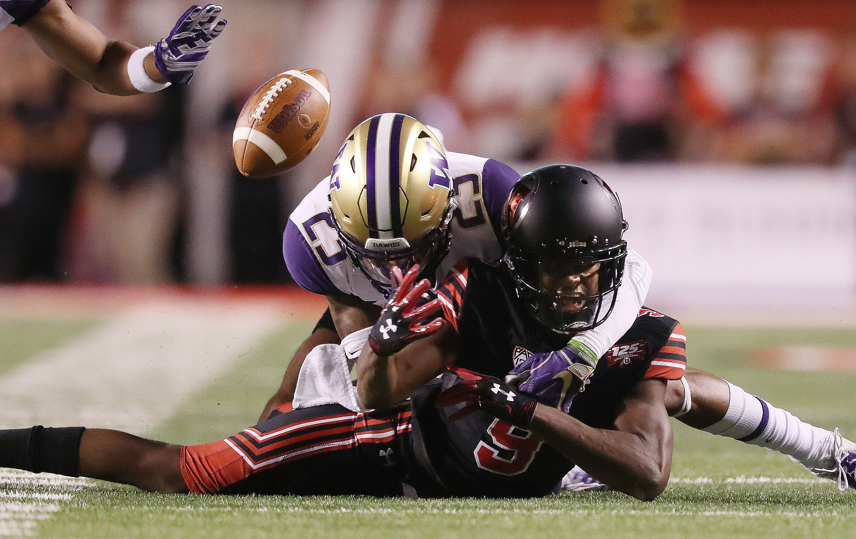Utah Utes wide receiver Bronson Boyd (9) cant come up with the catch on pressure form Washington Huskies linebacker Ben Burr-Kirven (25) in Salt Lake City on Saturday, Sept. 15, 2018. (Photo: Jeffrey D. Allred, KSL)